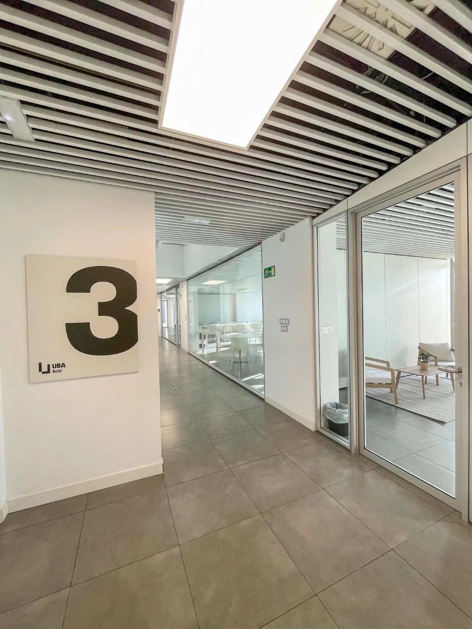 Communal lounge/ TV room in UBA Hostel