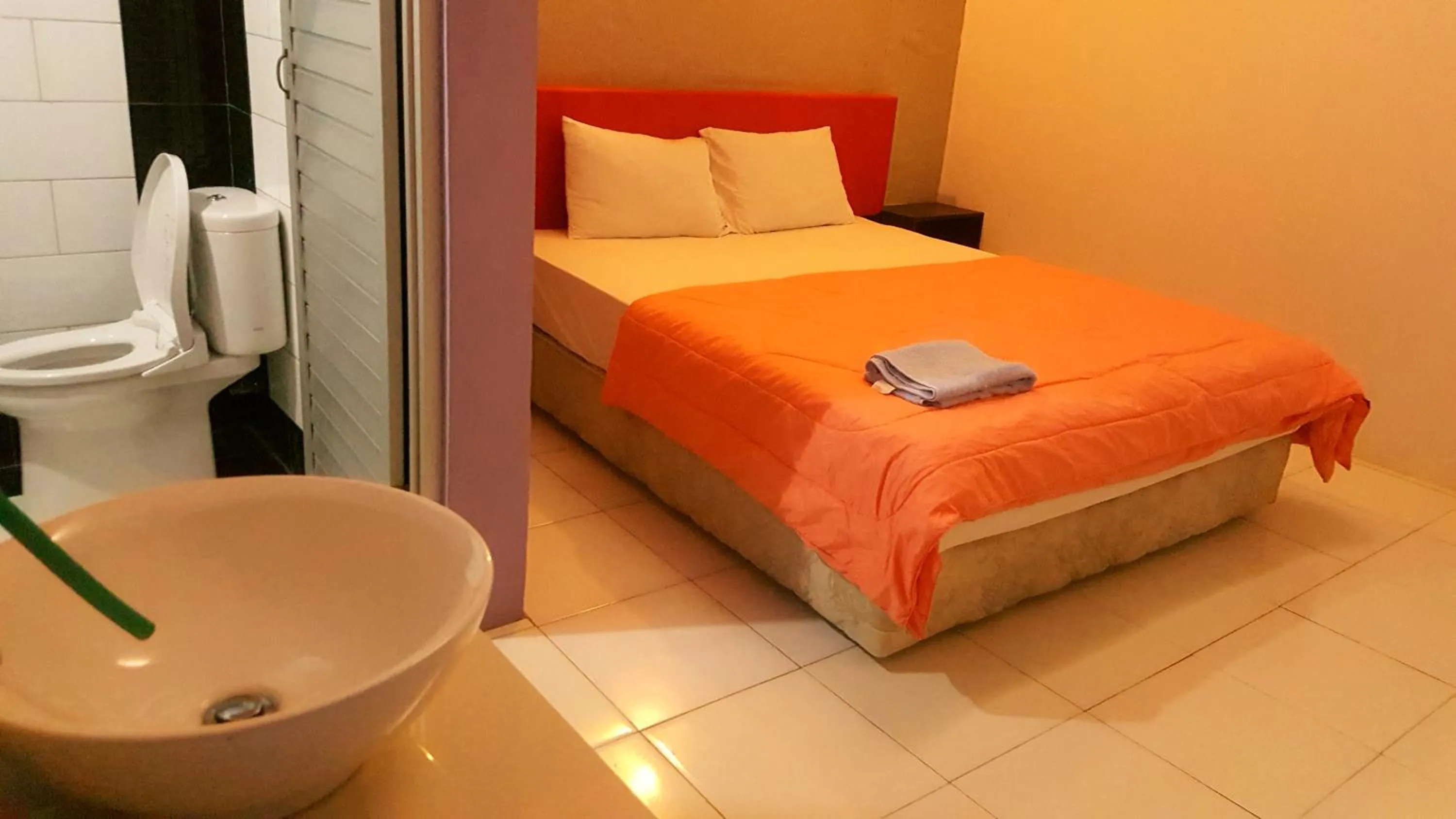 Bed in HOTEL SEGARA MANDALA