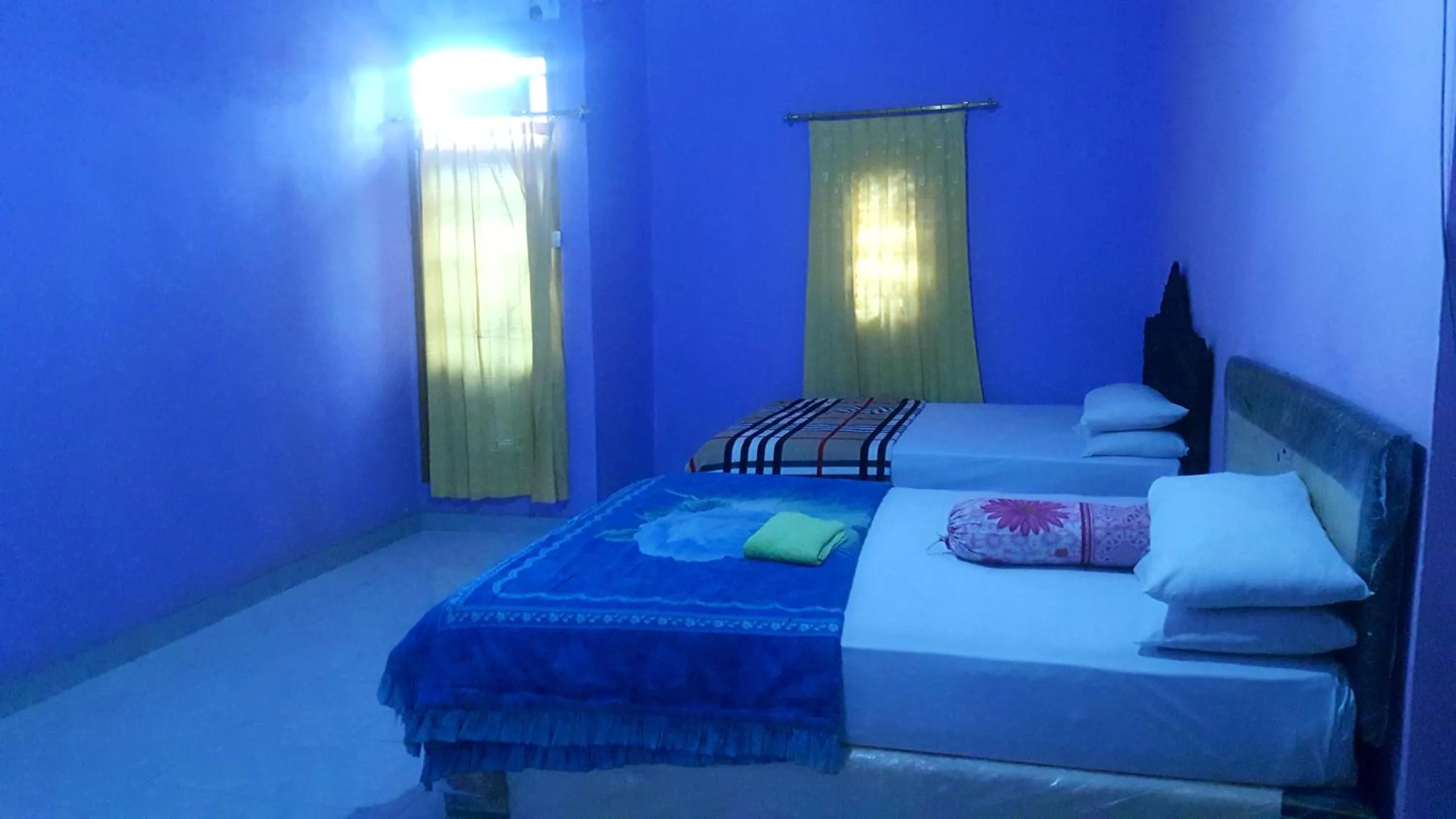 Bed in HOTEL SEGARA MANDALA