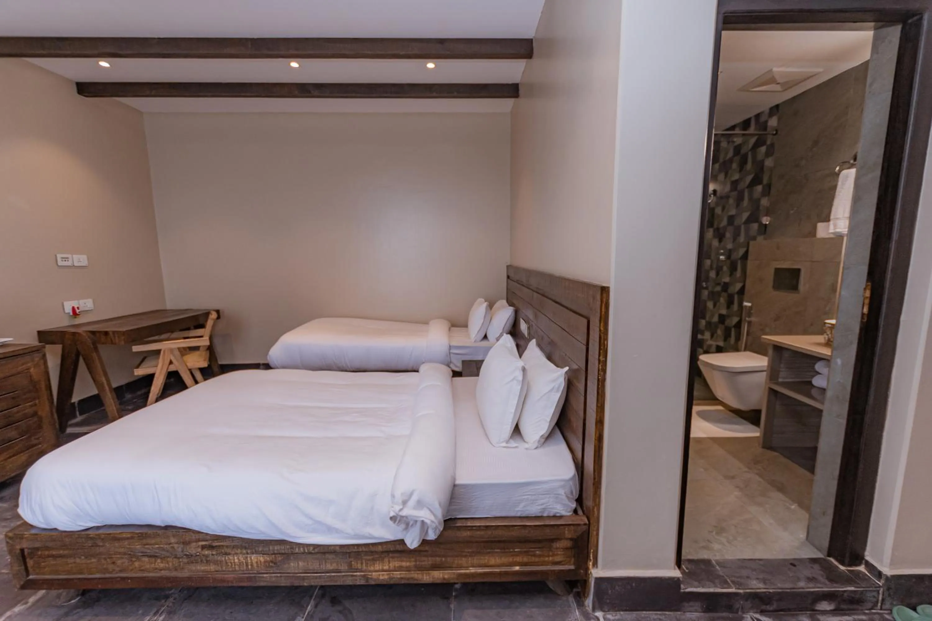 Photo of the whole room, Bed in Raniban Retreat