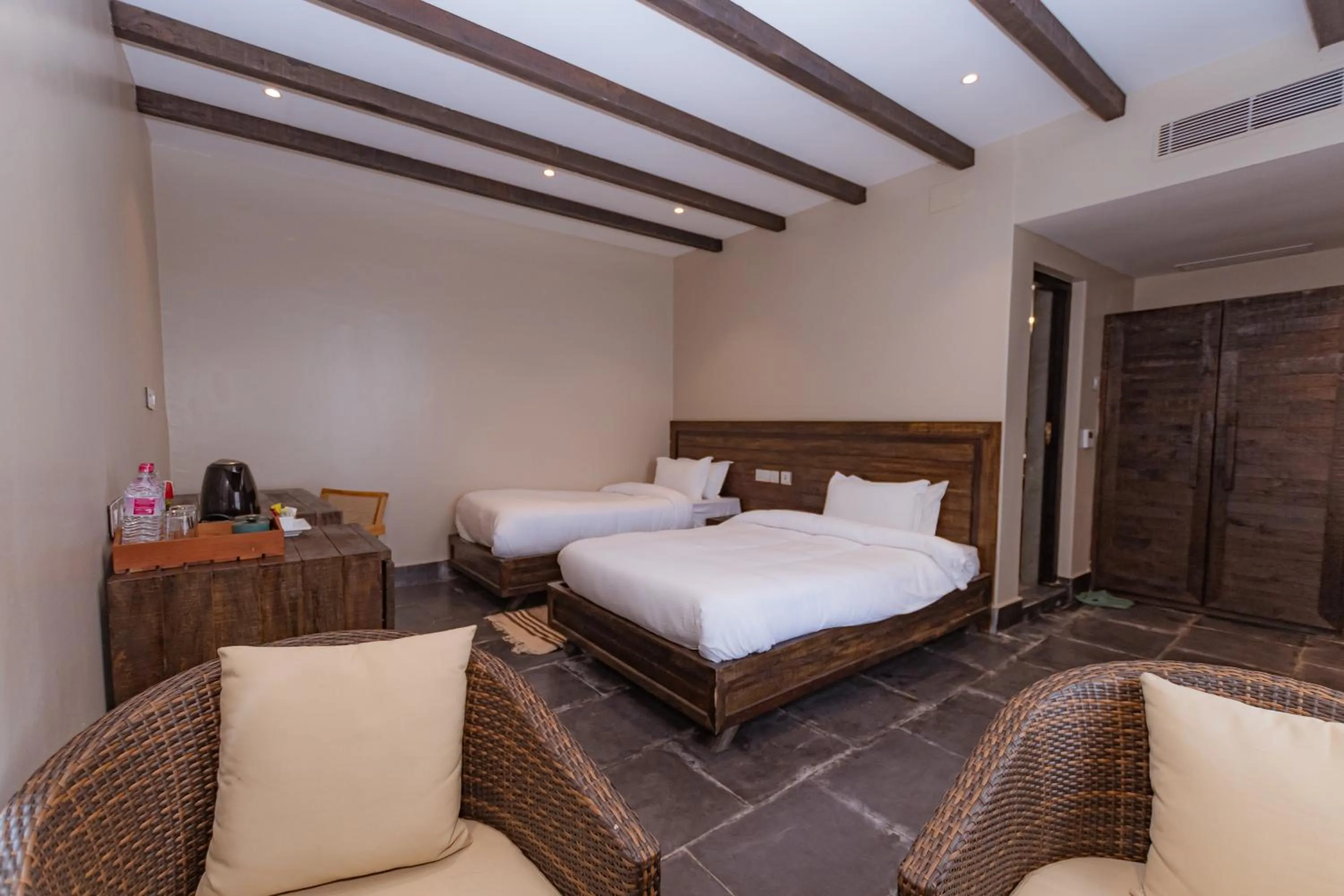 Photo of the whole room, Bed in Raniban Retreat
