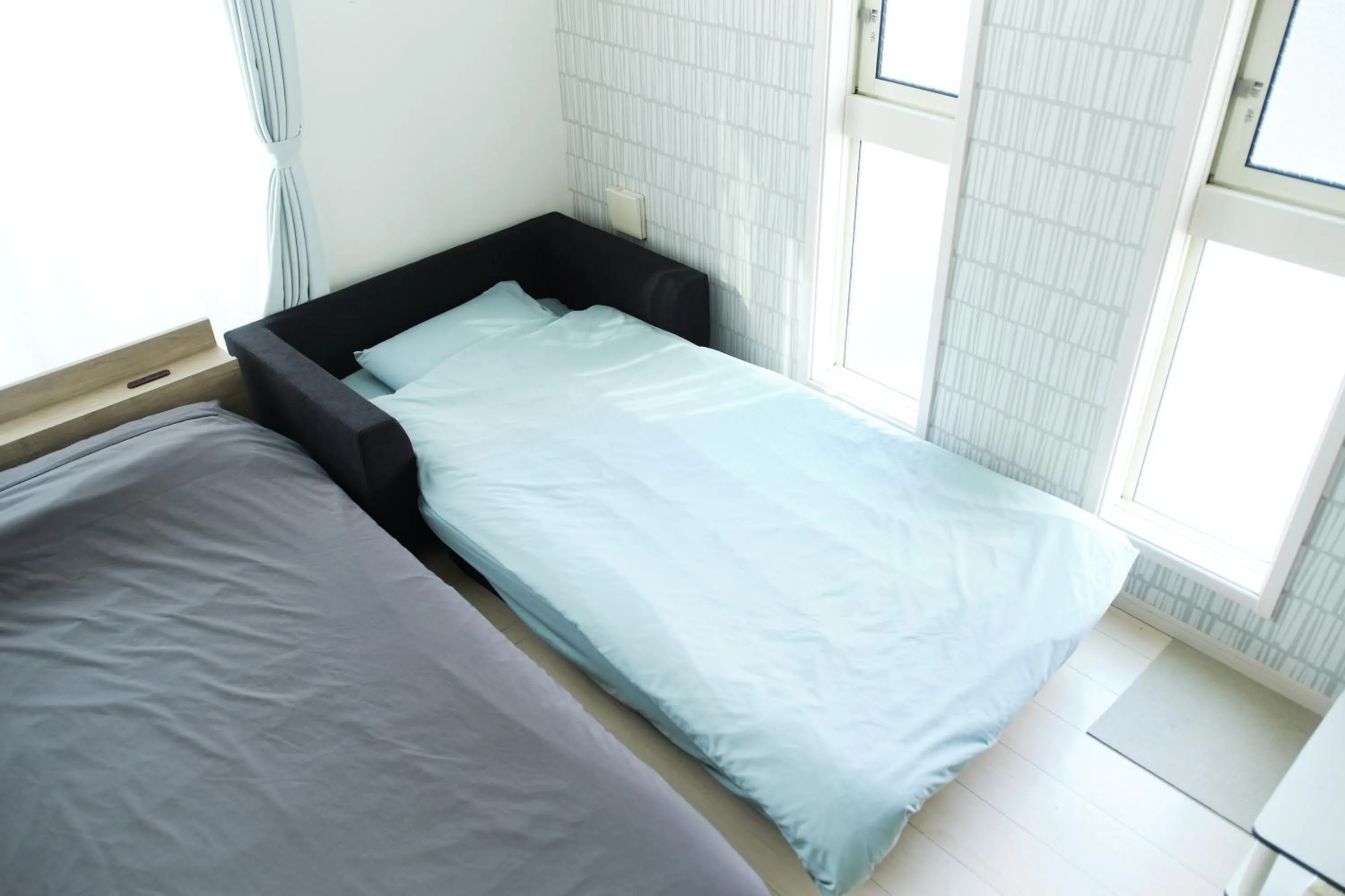 Bed in Soshigaya Apartment by Tranova