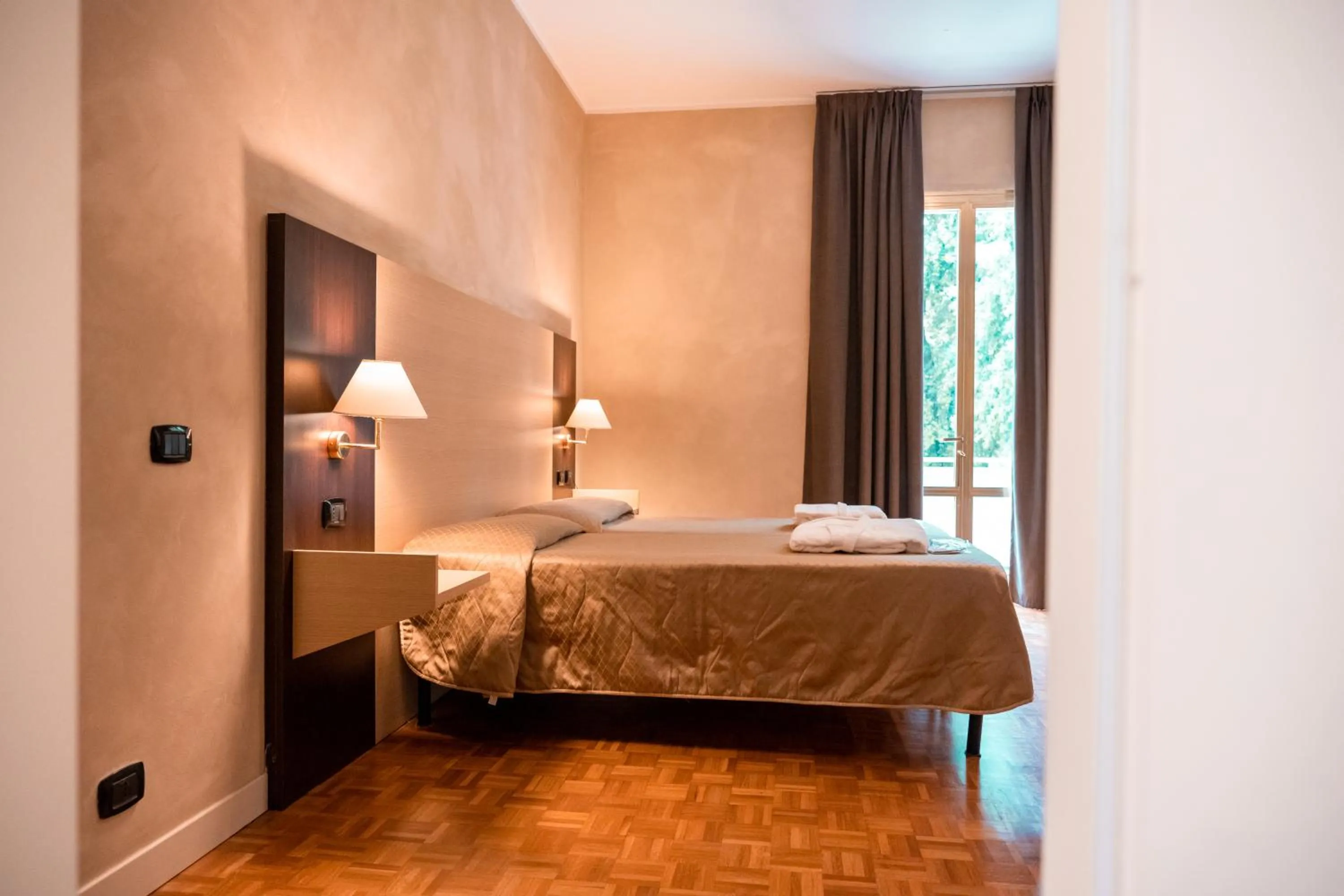 Bed in Hotel Terme Pellegrini