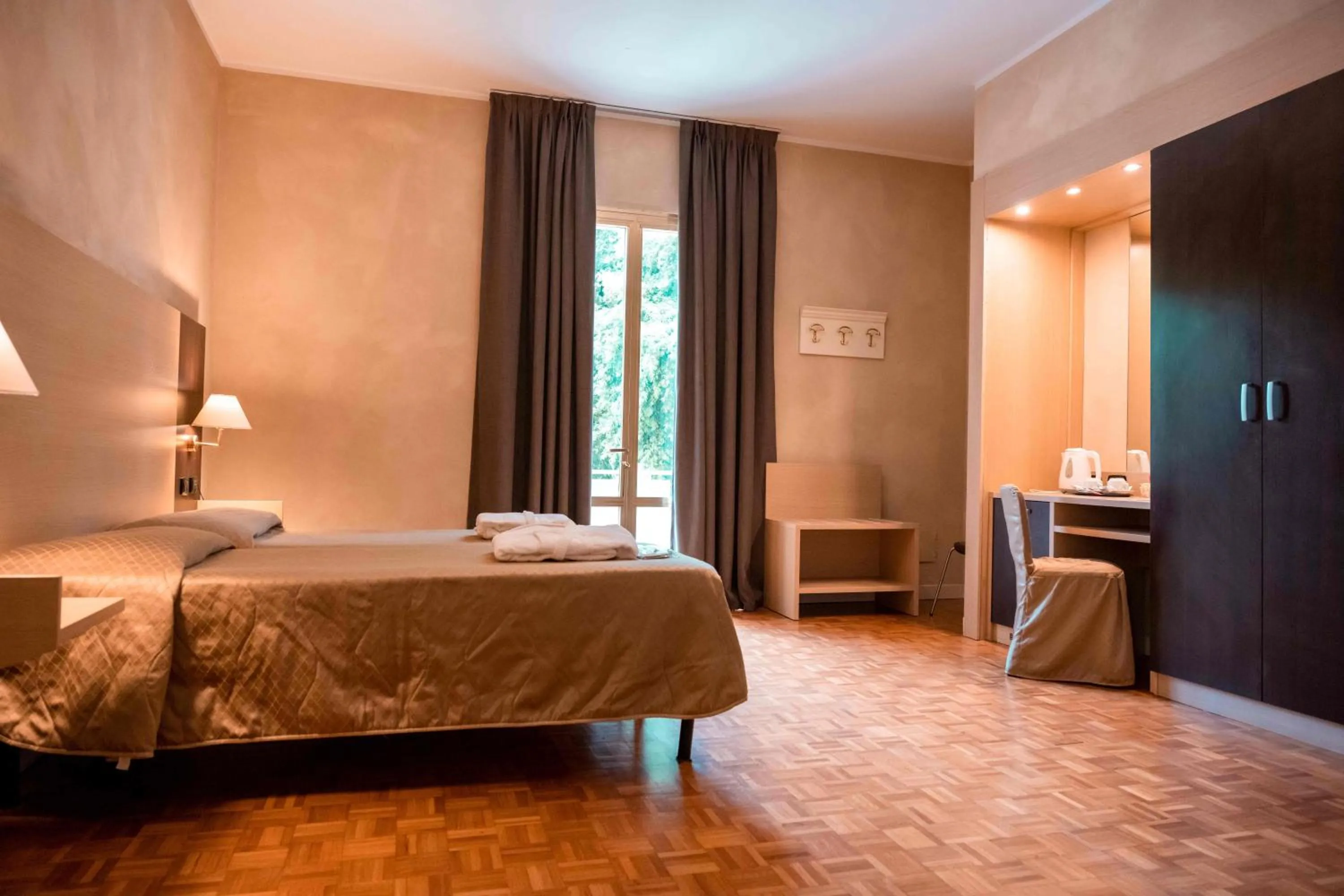 Bed in Hotel Terme Pellegrini