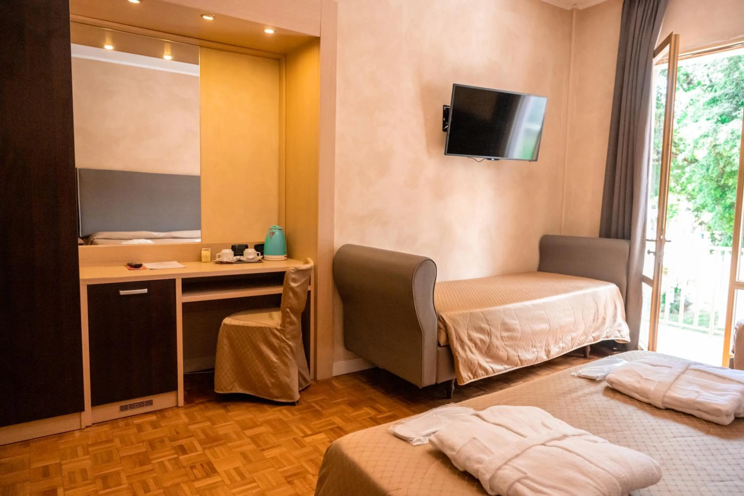 Bed in Hotel Terme Pellegrini