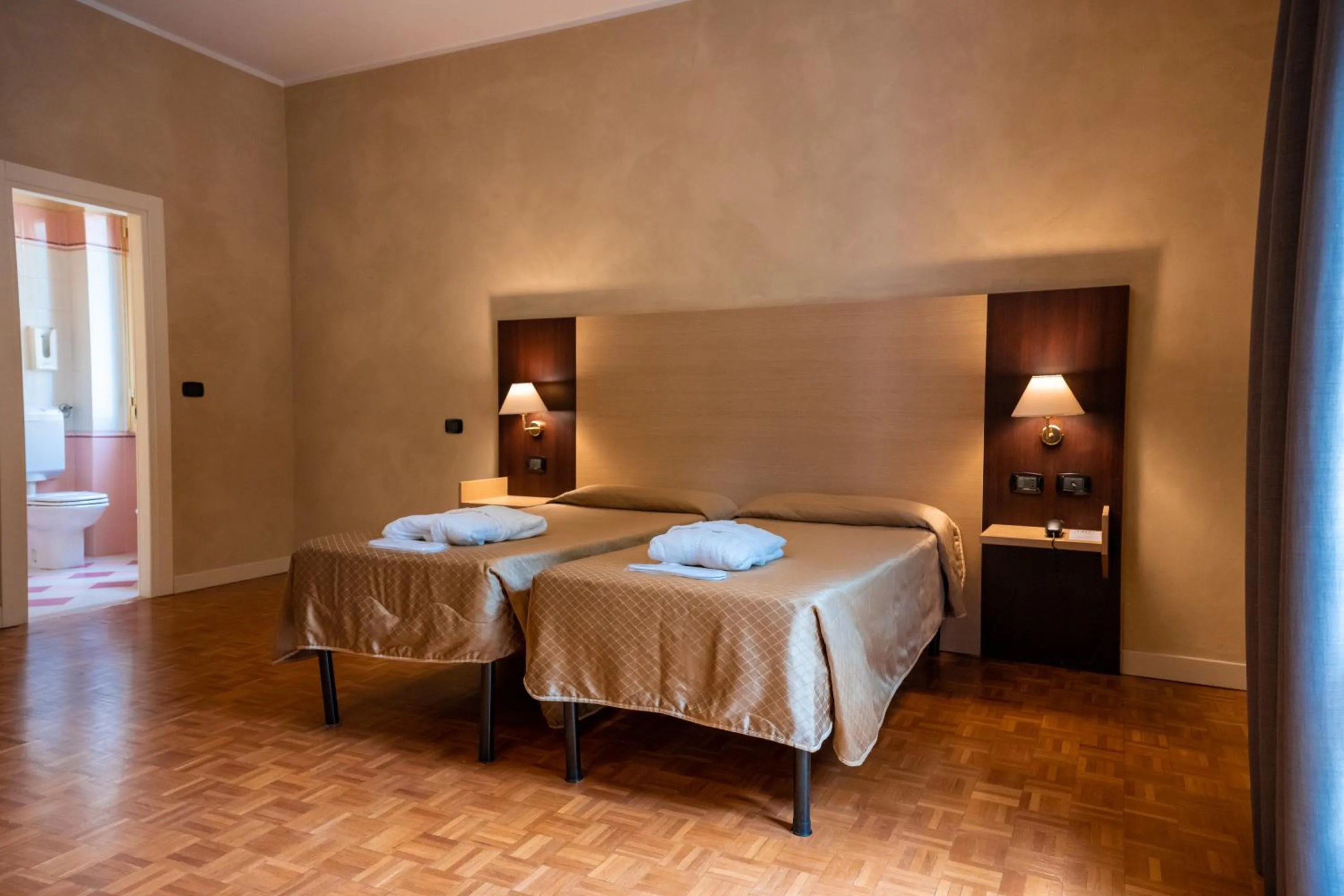 Bed in Hotel Terme Pellegrini