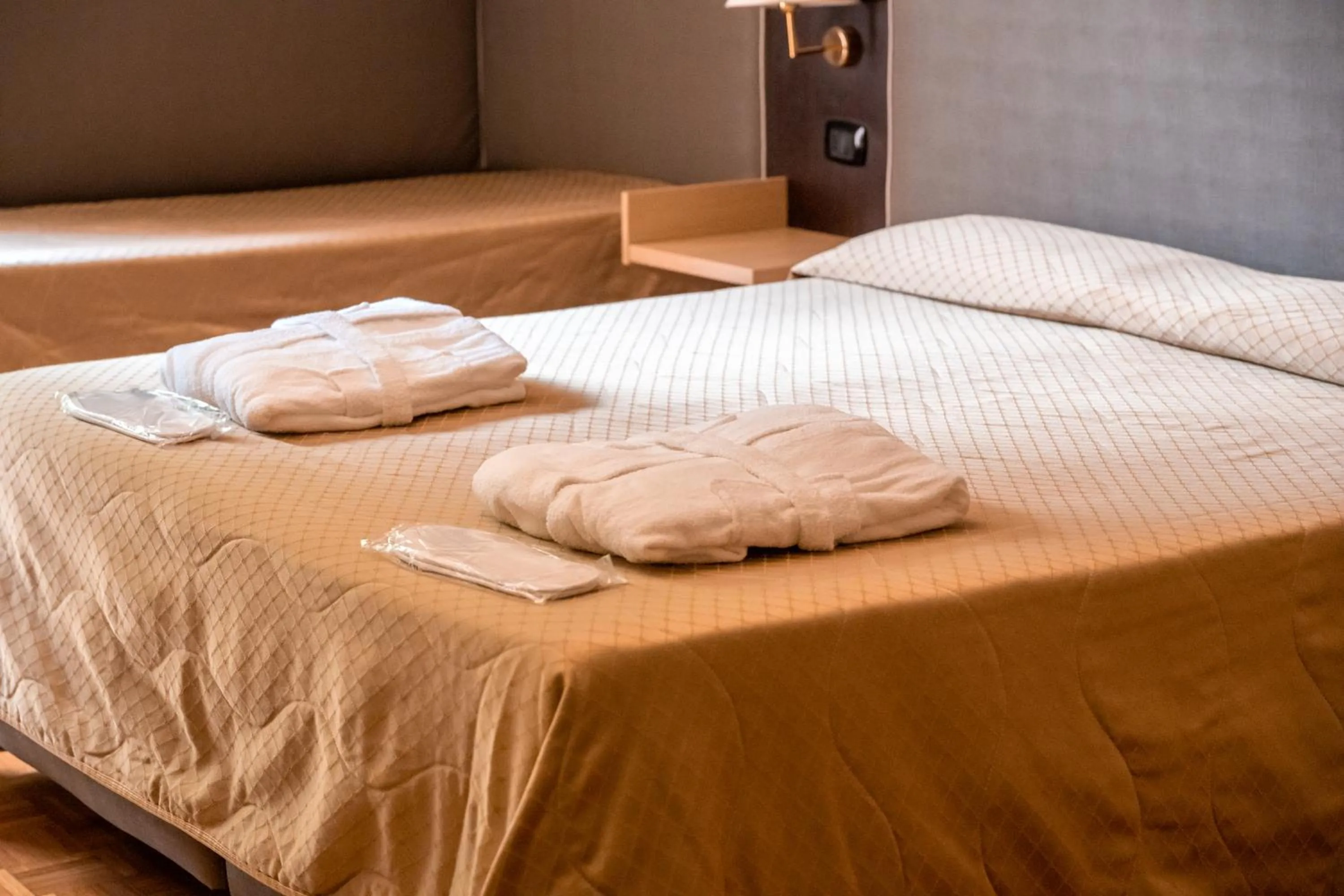 Bed in Hotel Terme Pellegrini