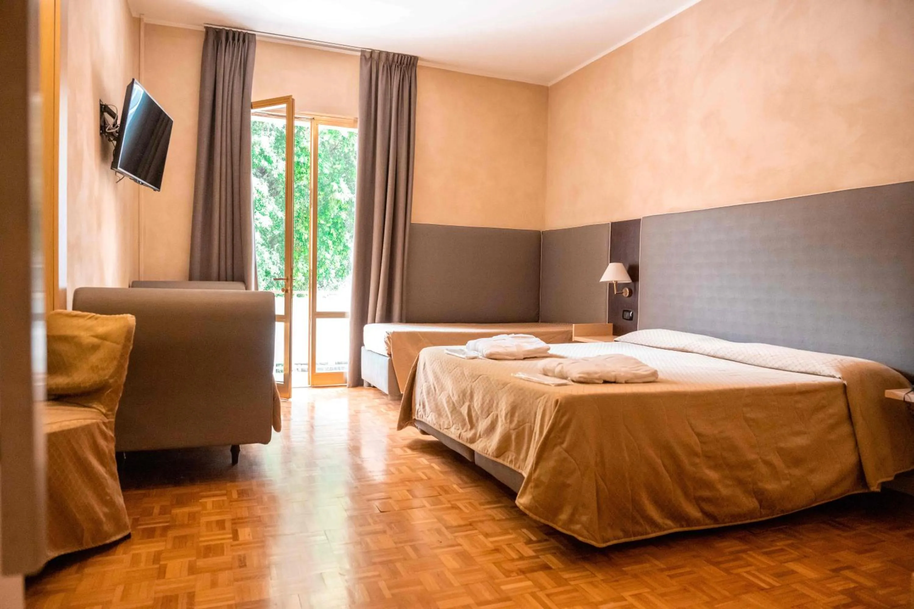 Bed in Hotel Terme Pellegrini