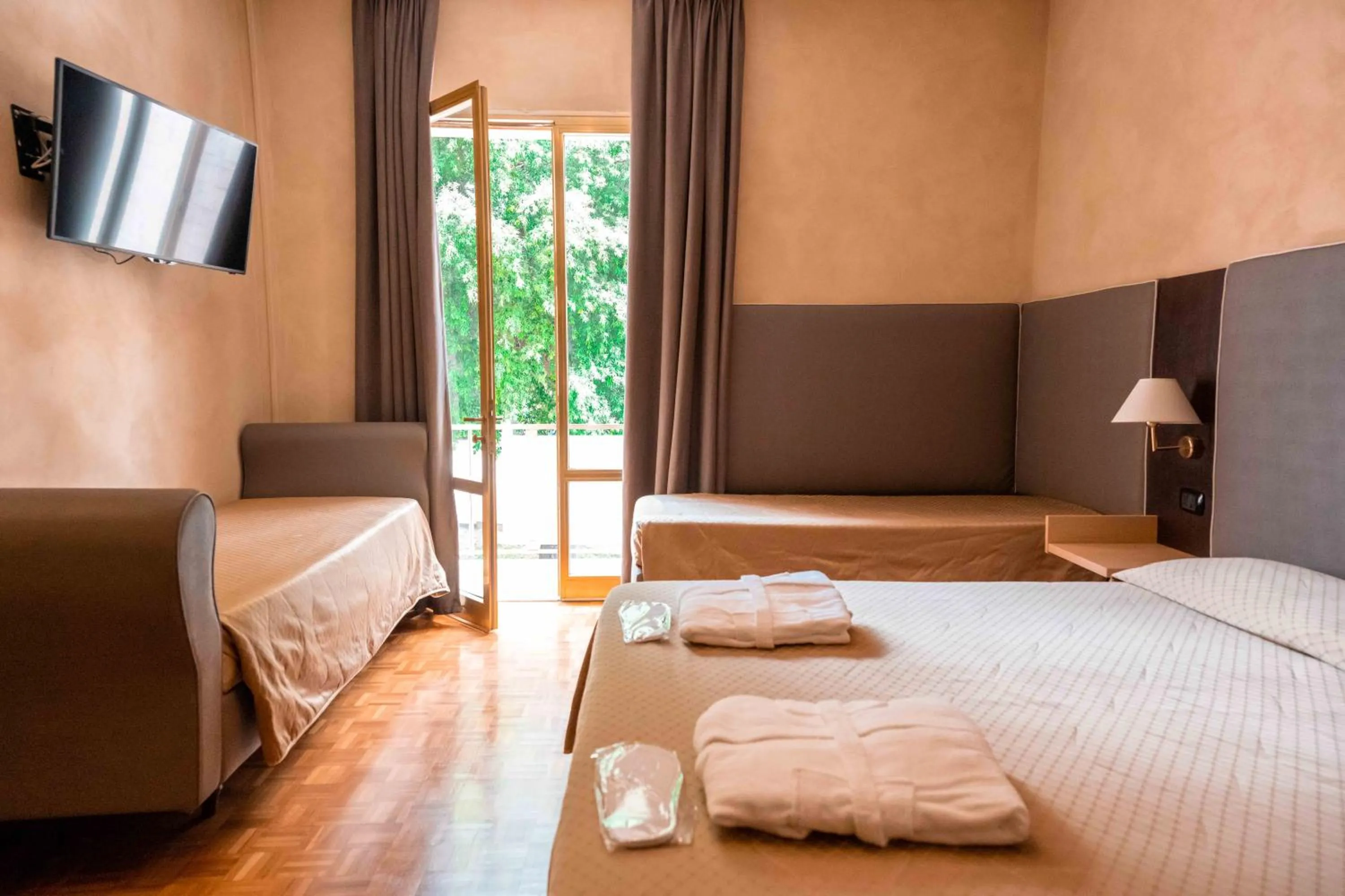 Bed in Hotel Terme Pellegrini