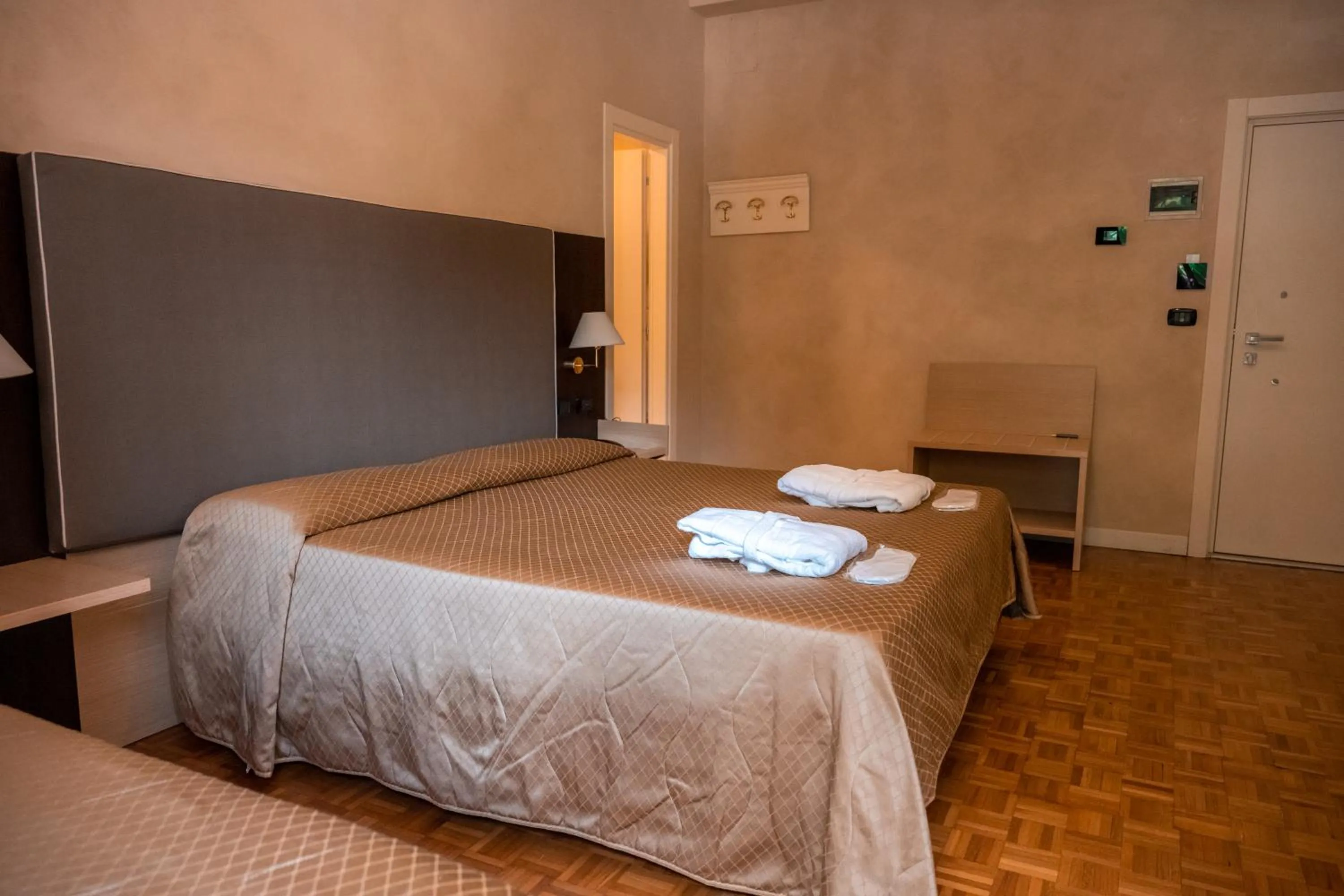 Bed in Hotel Terme Pellegrini
