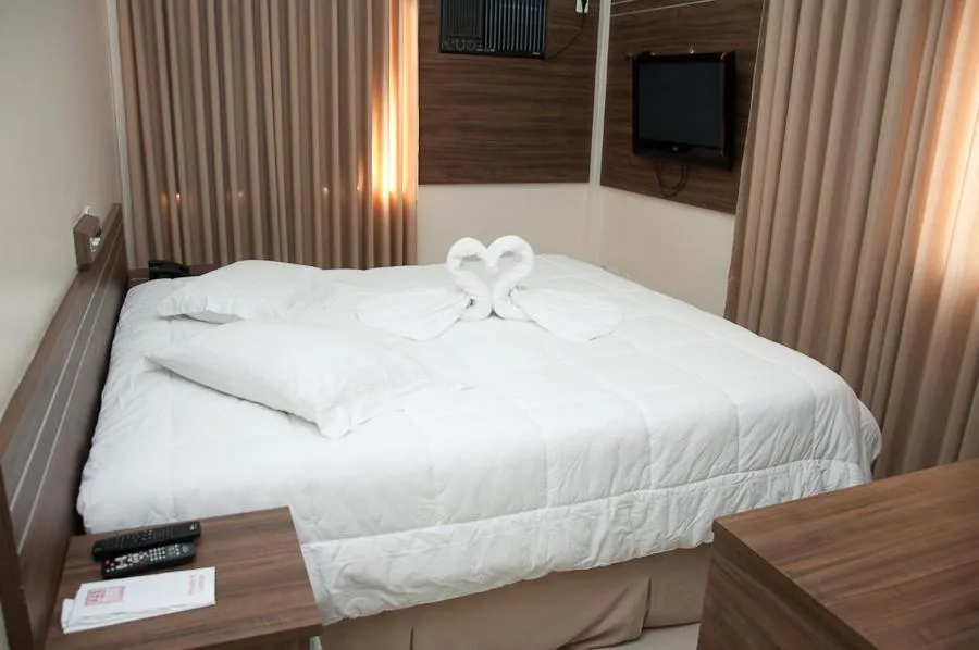 Bed in Plaza Suite Hotel