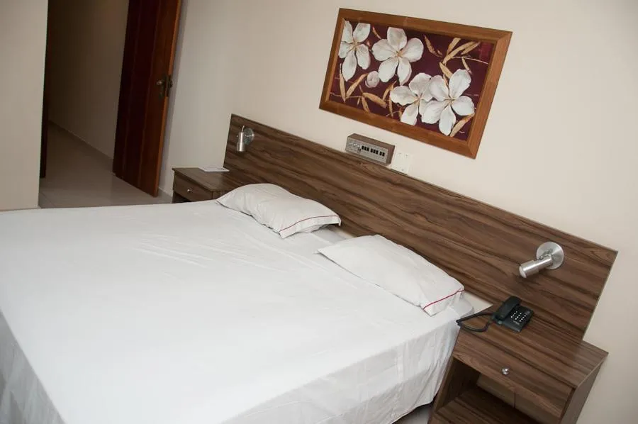 Bed in Plaza Suite Hotel