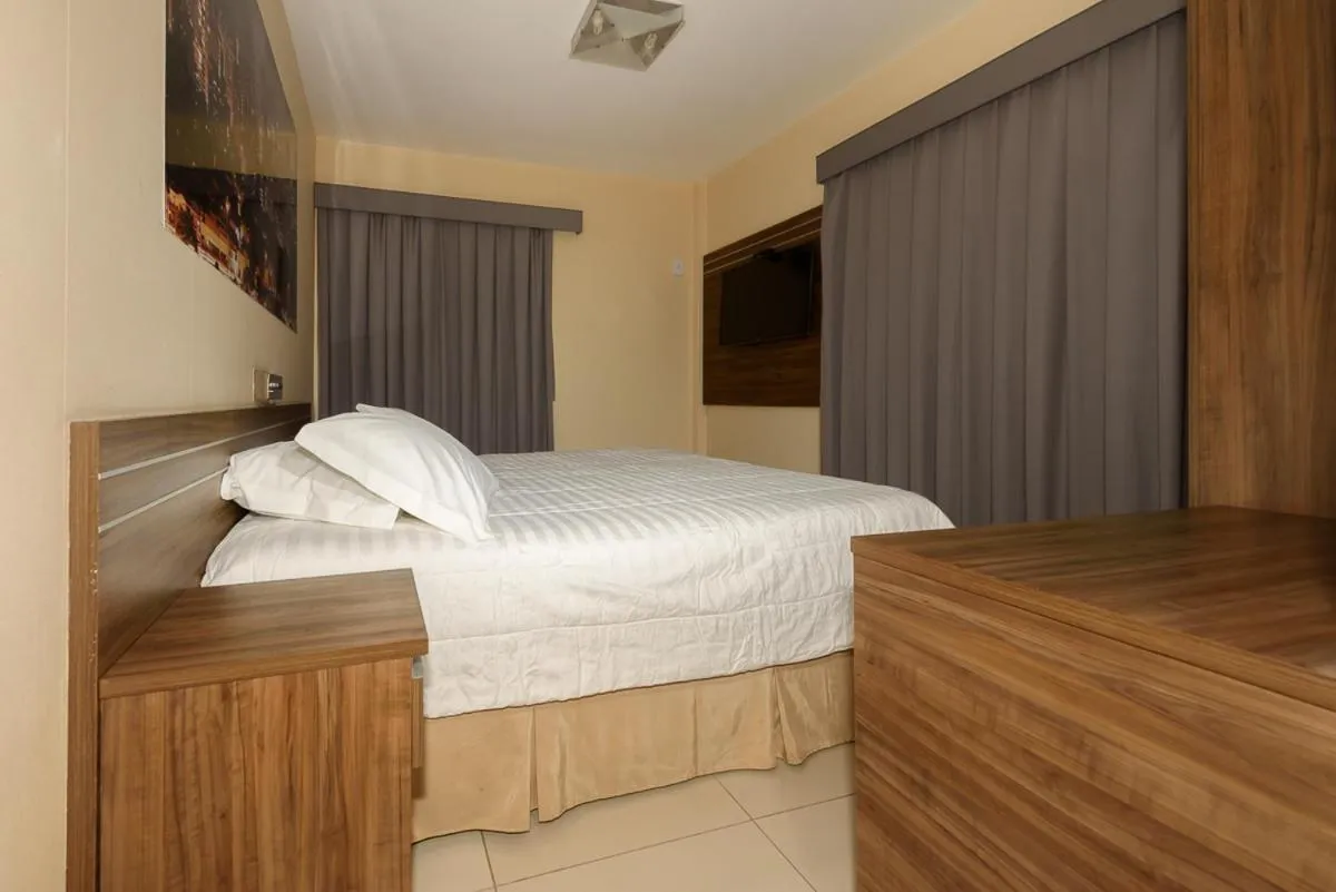 Bed in Plaza Suite Hotel