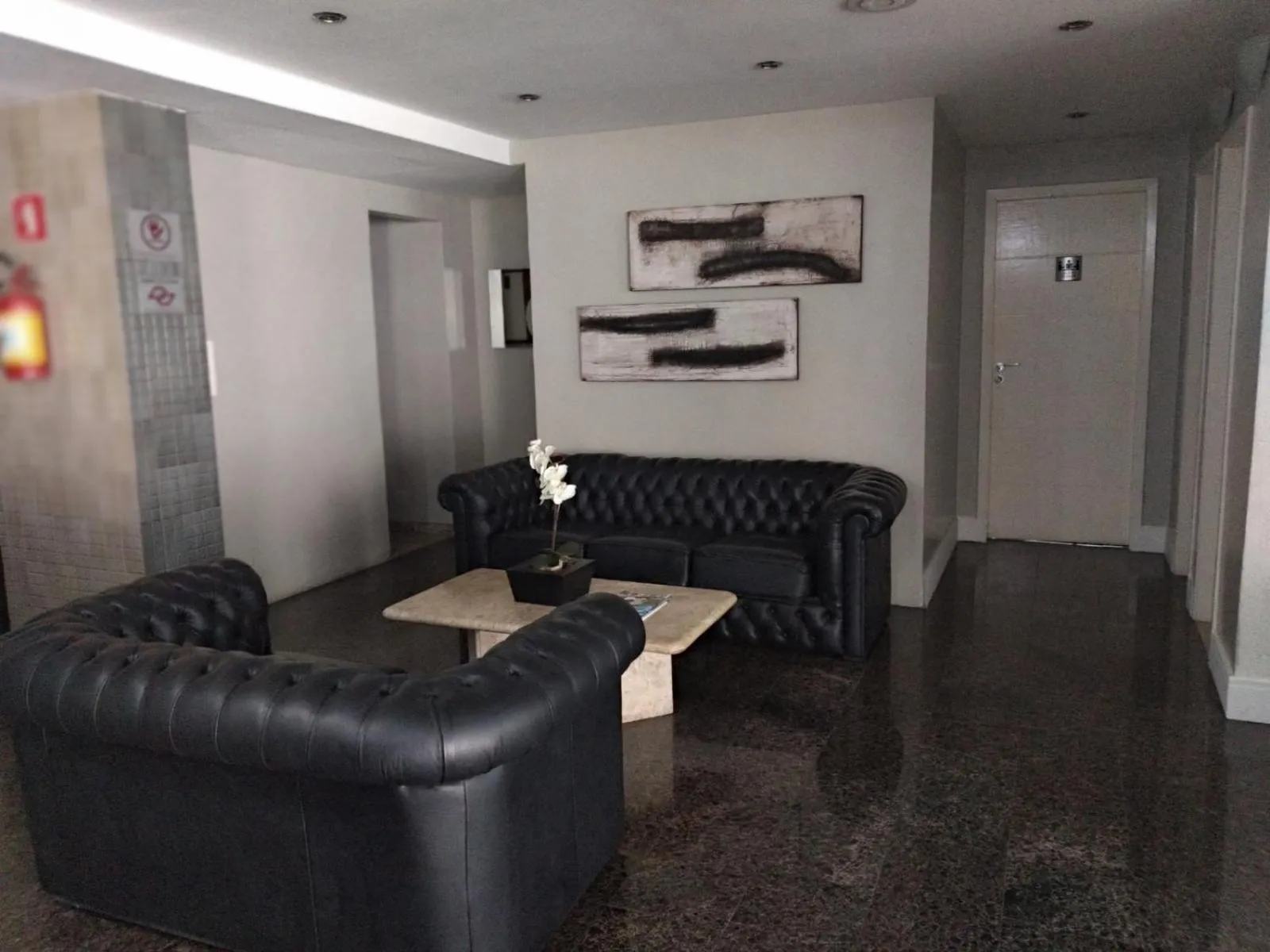 Lobby or reception in Plaza Suite Hotel