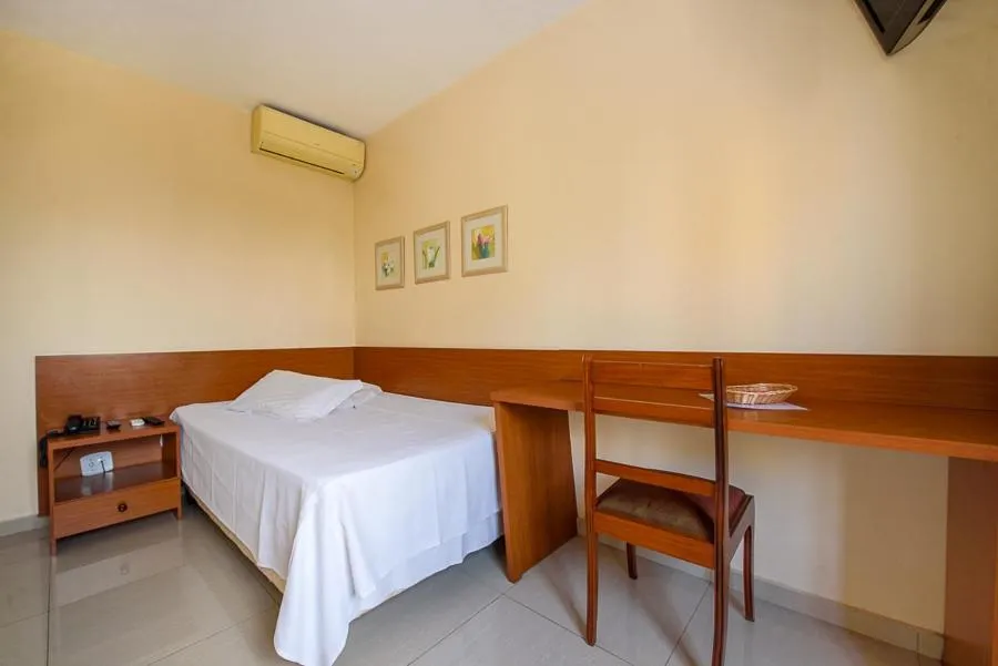 Bed in Plaza Suite Hotel