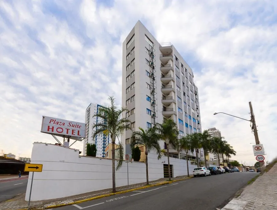 Property logo or sign in Plaza Suite Hotel