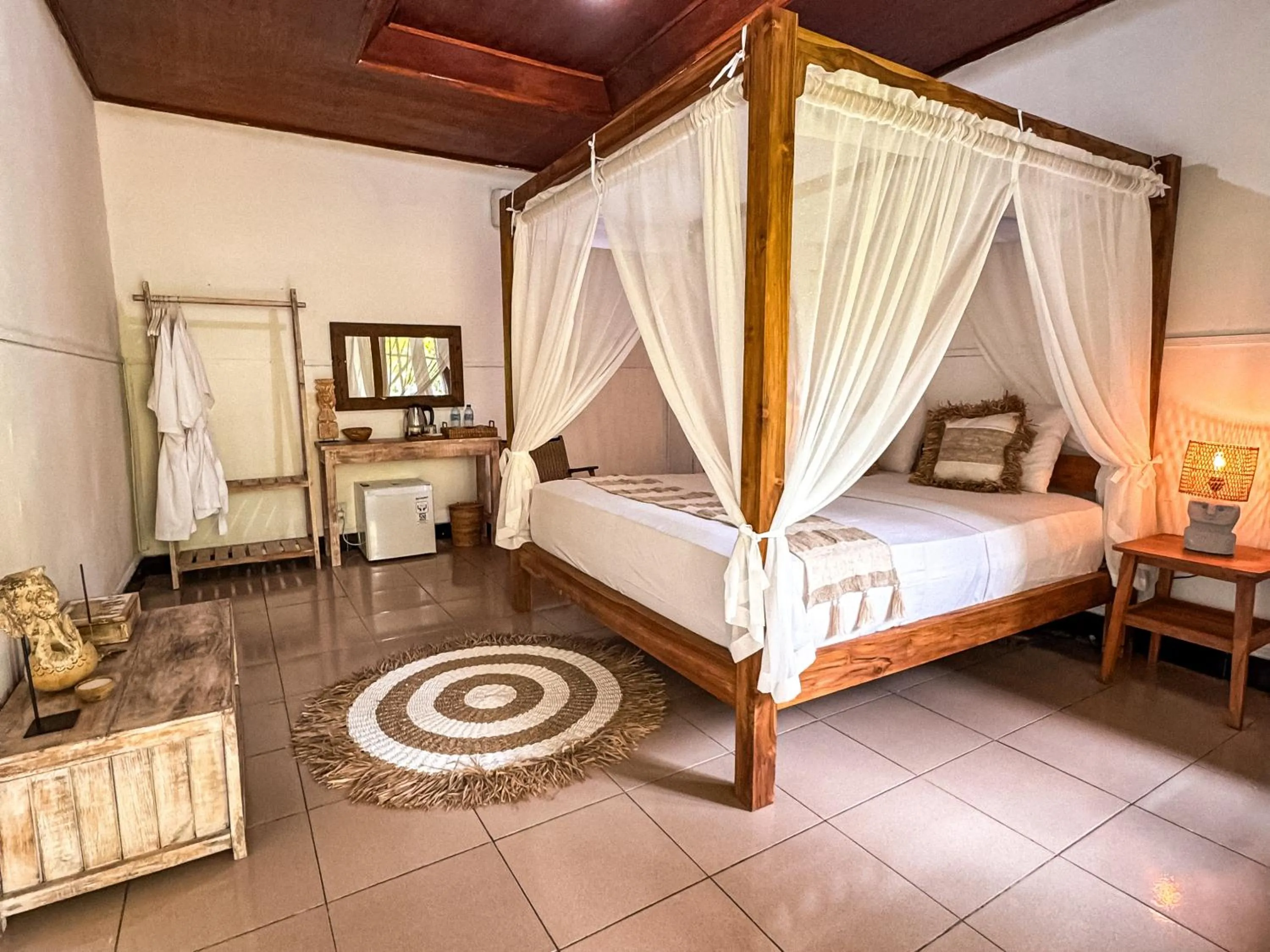 Bed in Pelangi Cottages Gili Air