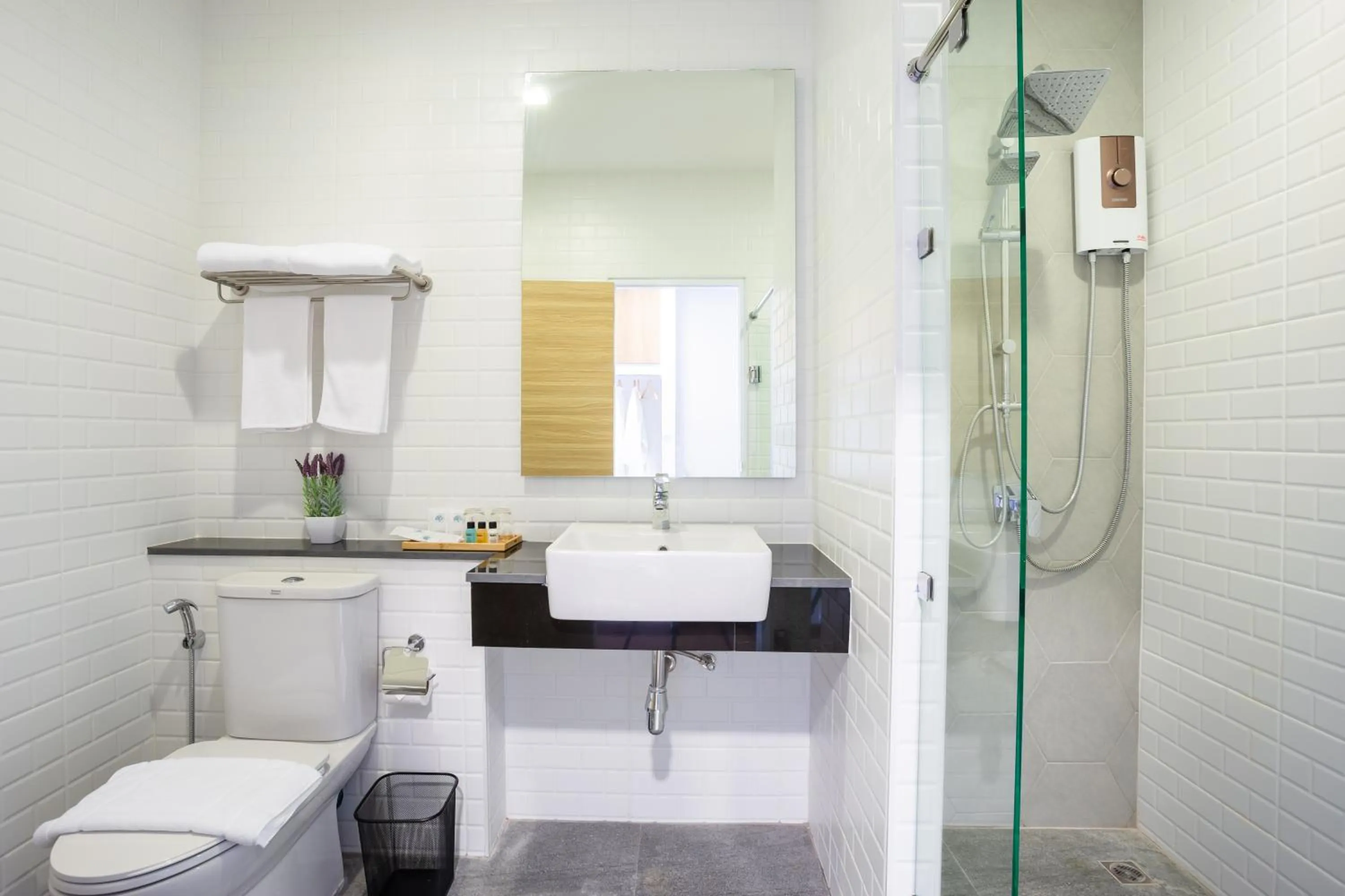 Bathroom in Icon Park Hotel, Chiang Mai- SHA Extra Plus