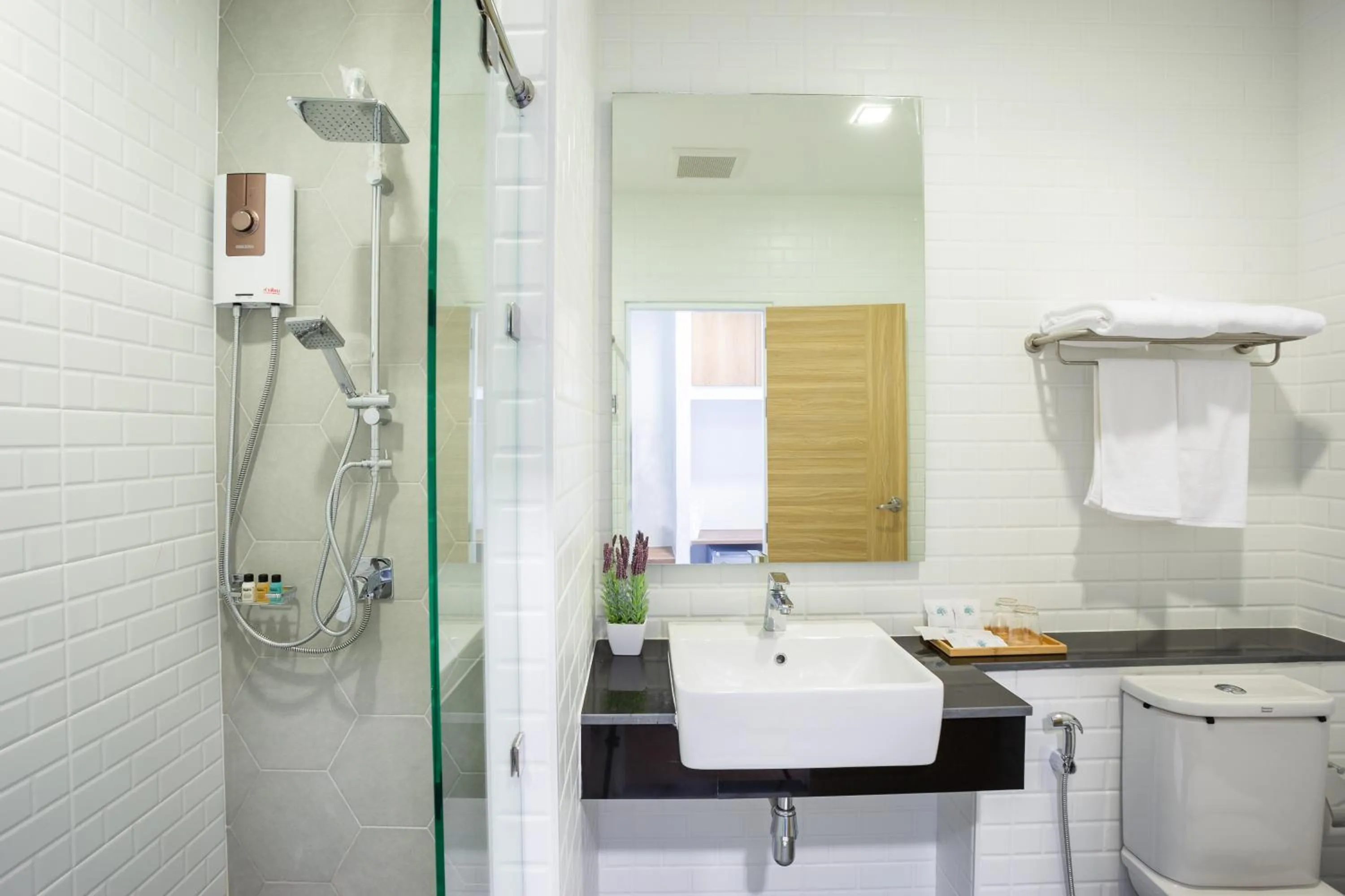 Shower in Icon Park Hotel, Chiang Mai- SHA Extra Plus