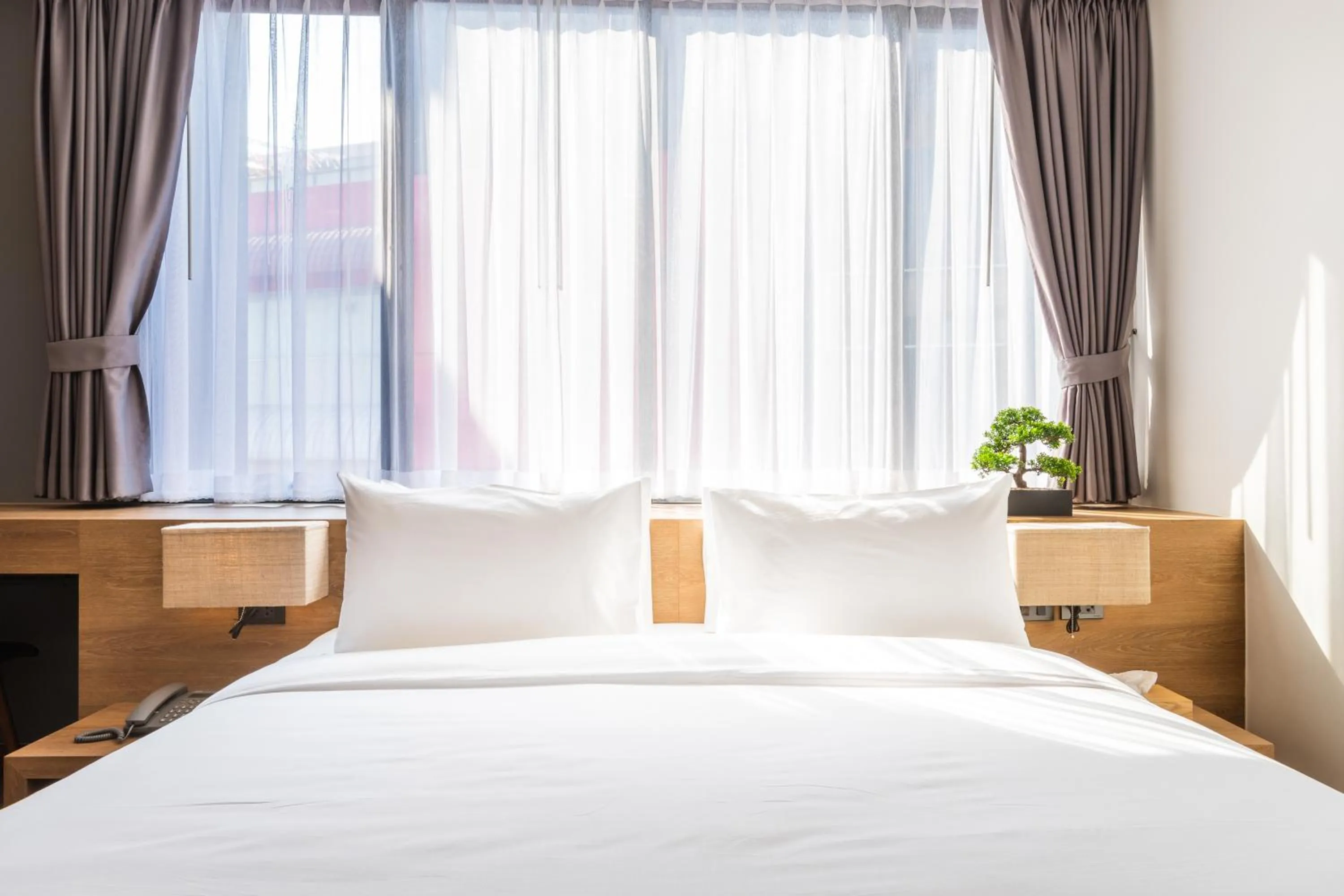 Bed in Icon Park Hotel, Chiang Mai- SHA Extra Plus