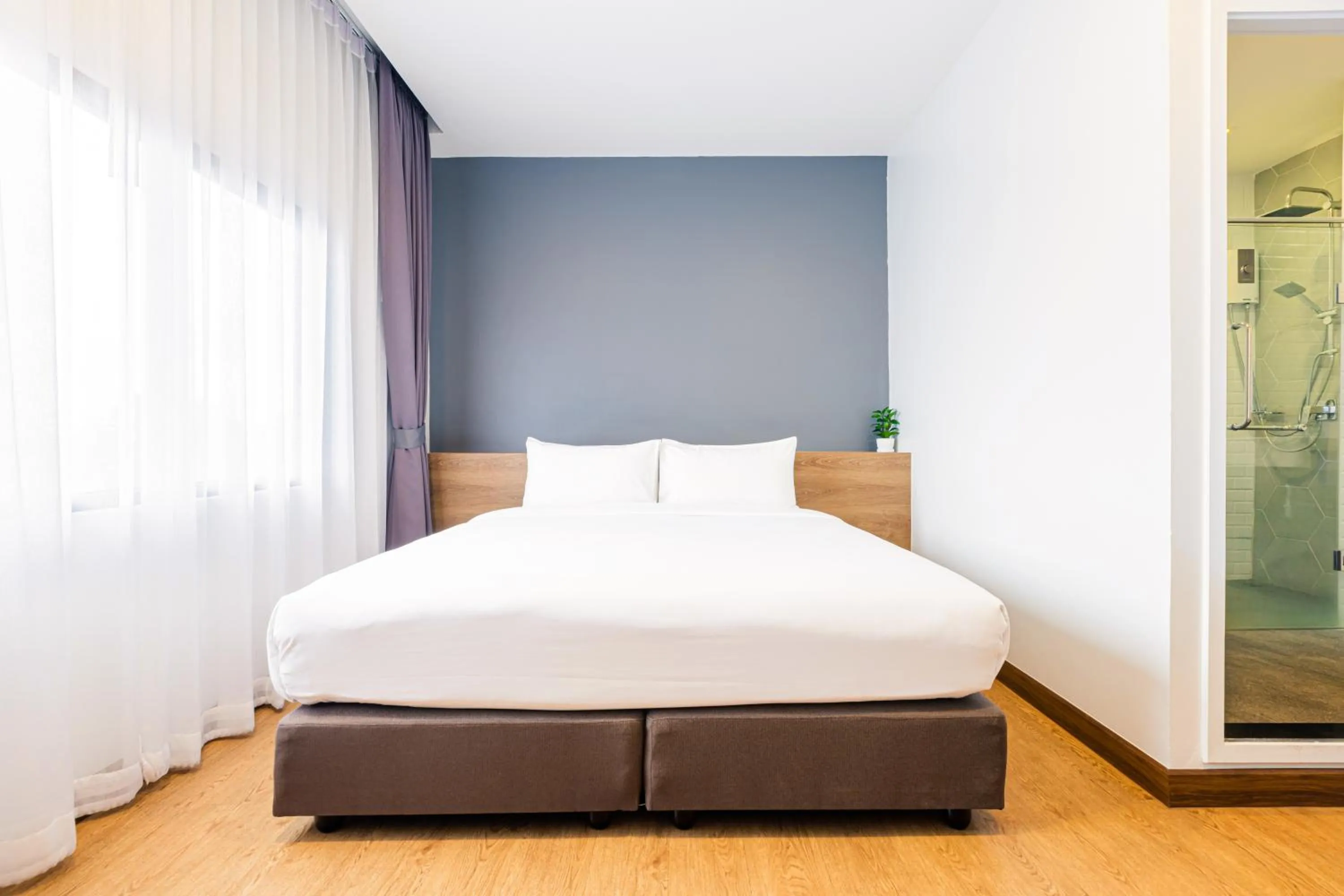 Bed in Icon Park Hotel, Chiang Mai- SHA Extra Plus