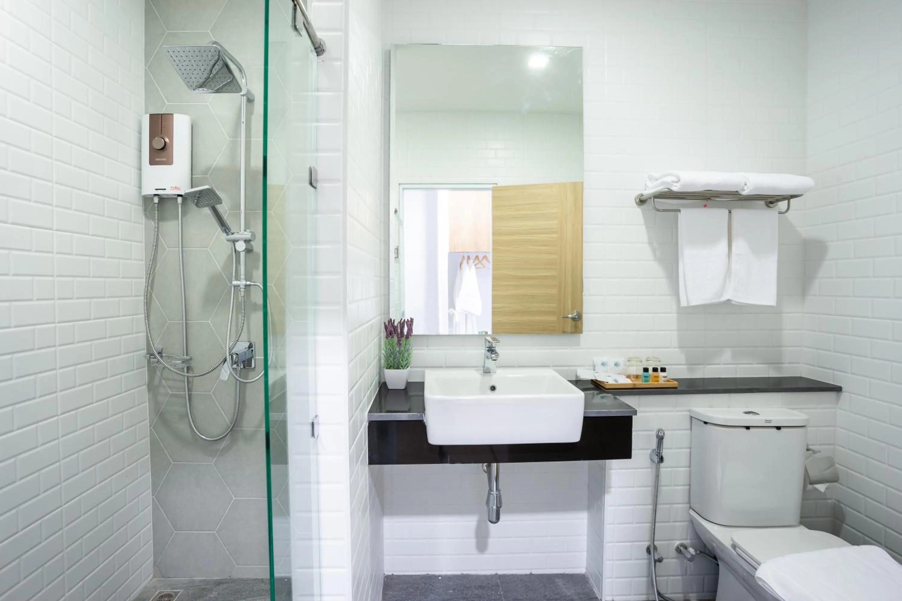 Shower in Icon Park Hotel, Chiang Mai- SHA Extra Plus