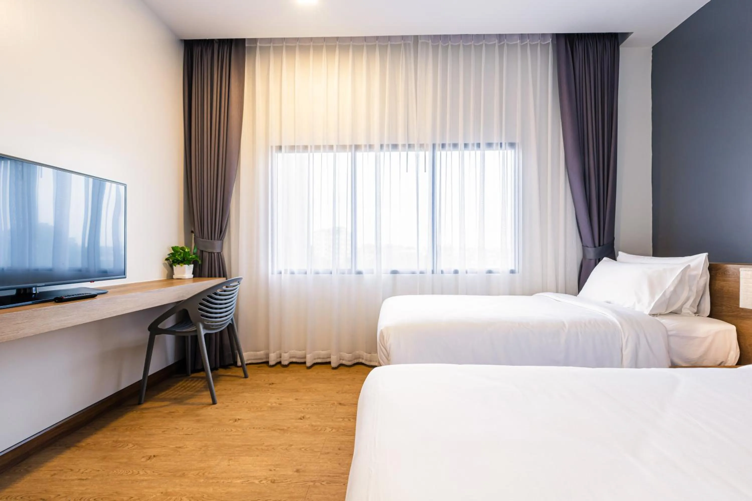 Bed in Icon Park Hotel, Chiang Mai- SHA Extra Plus