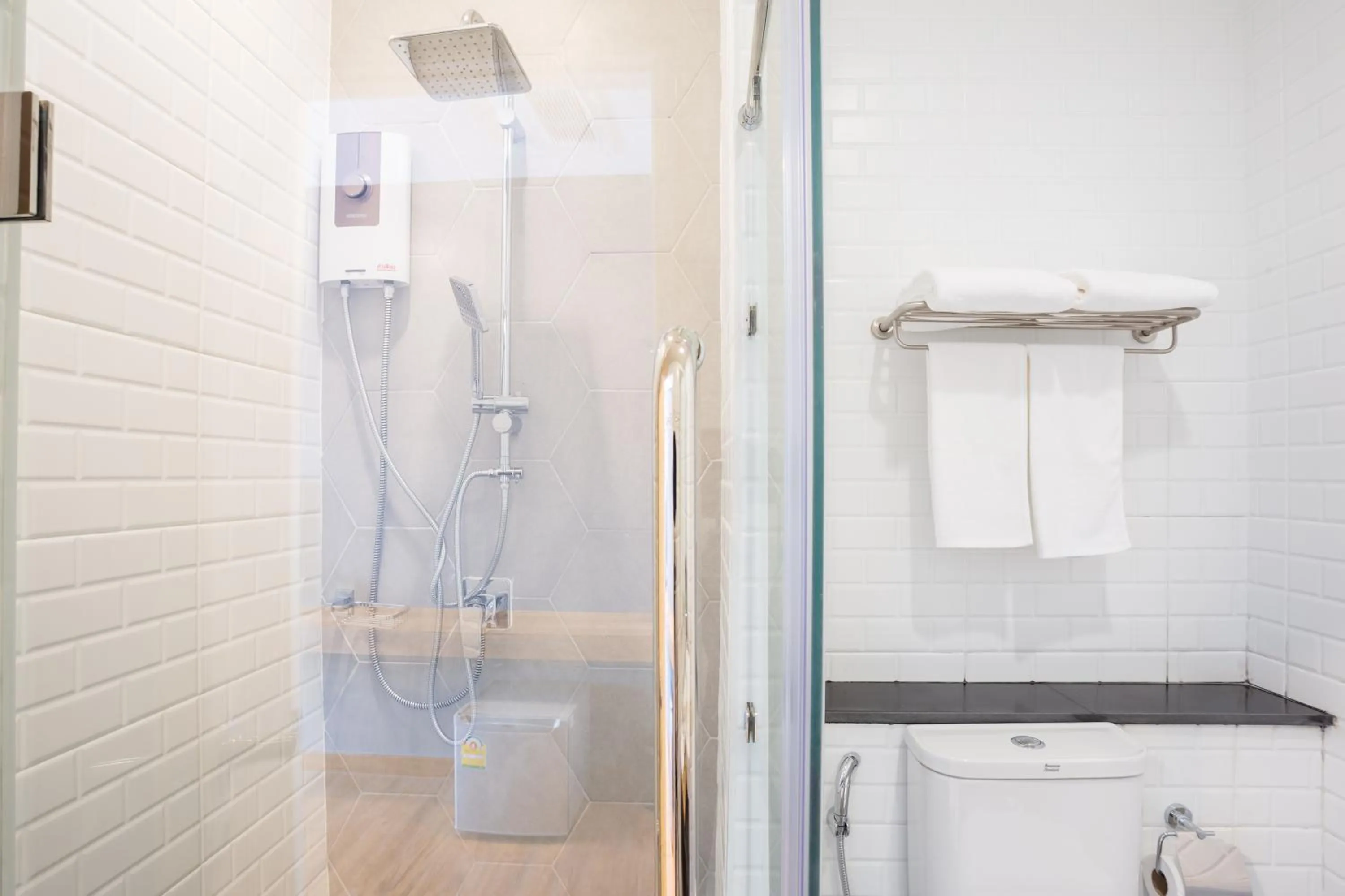 Shower in Icon Park Hotel, Chiang Mai- SHA Extra Plus