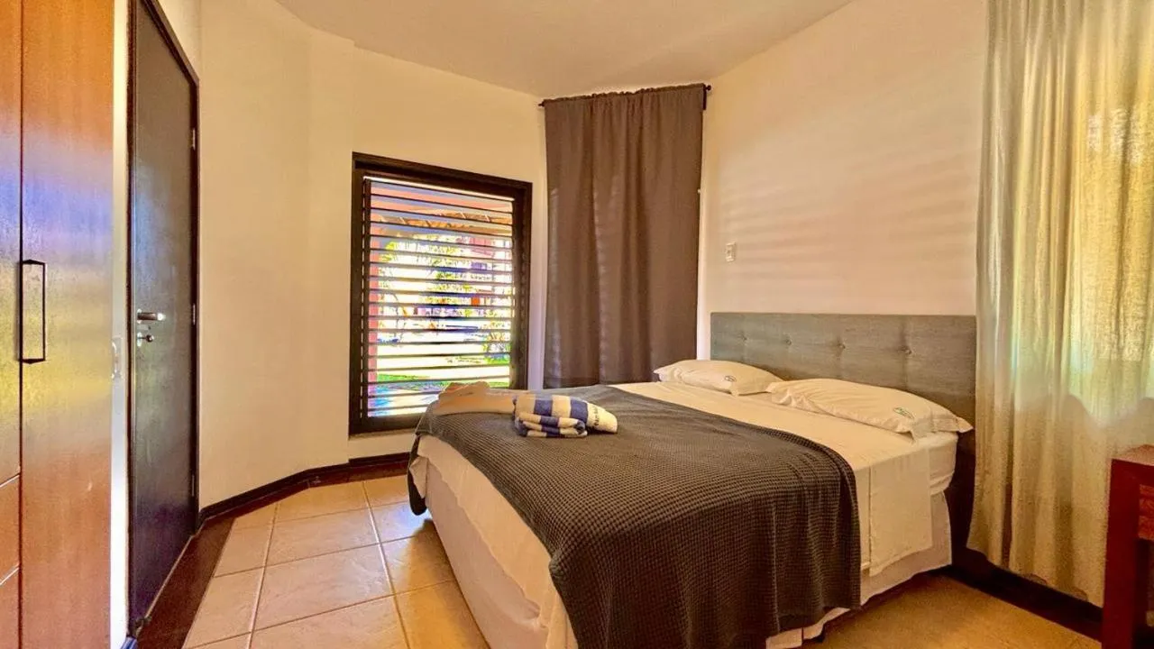 Bed in Dream Beach Cumbuco Oceanfront Apartments