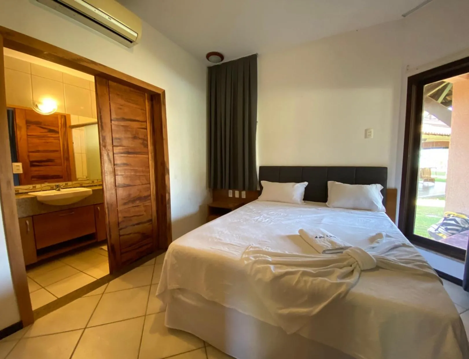 Bed in Dream Beach Cumbuco Oceanfront Apartments