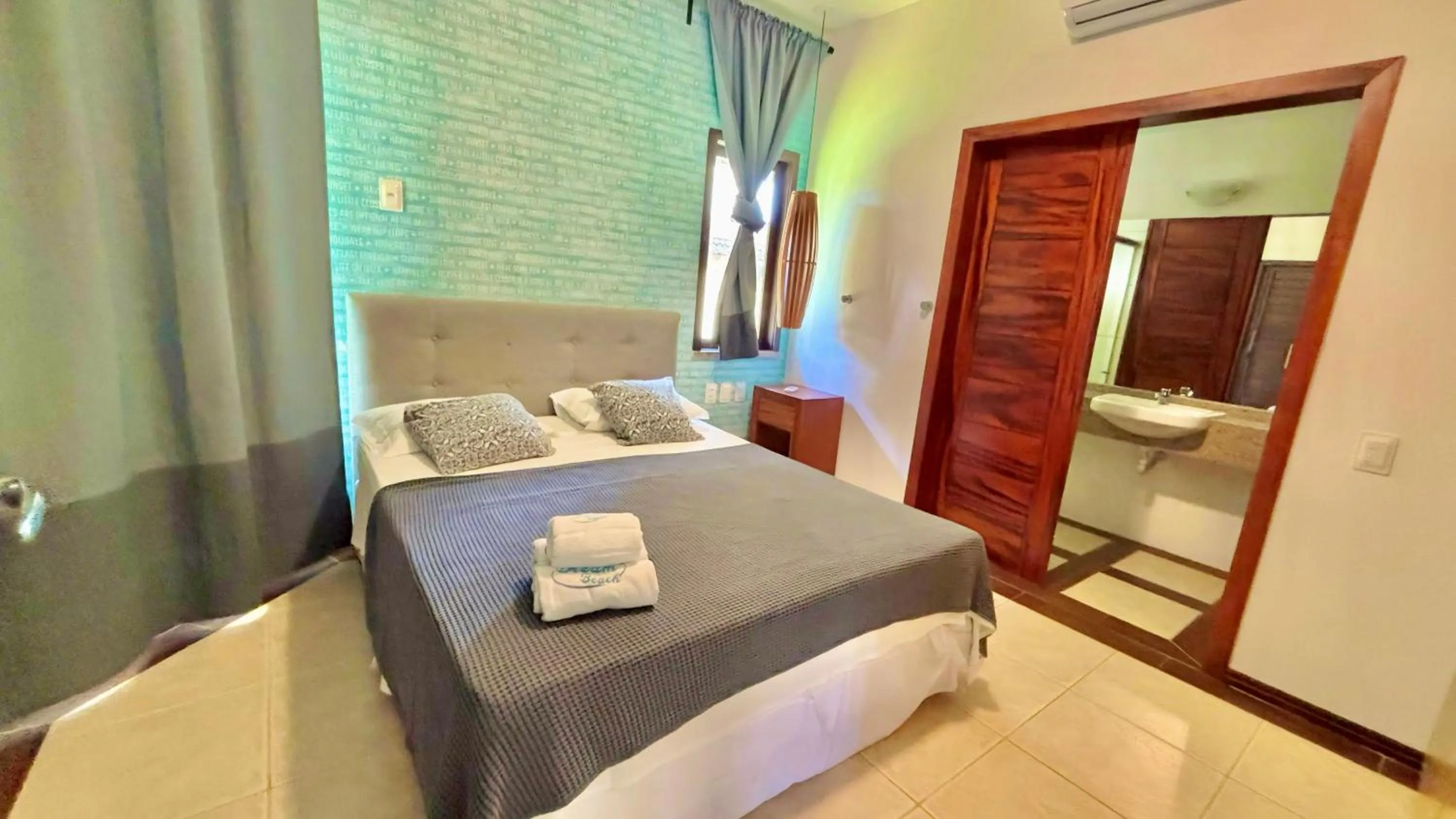 Bed in Dream Beach Cumbuco Oceanfront Apartments