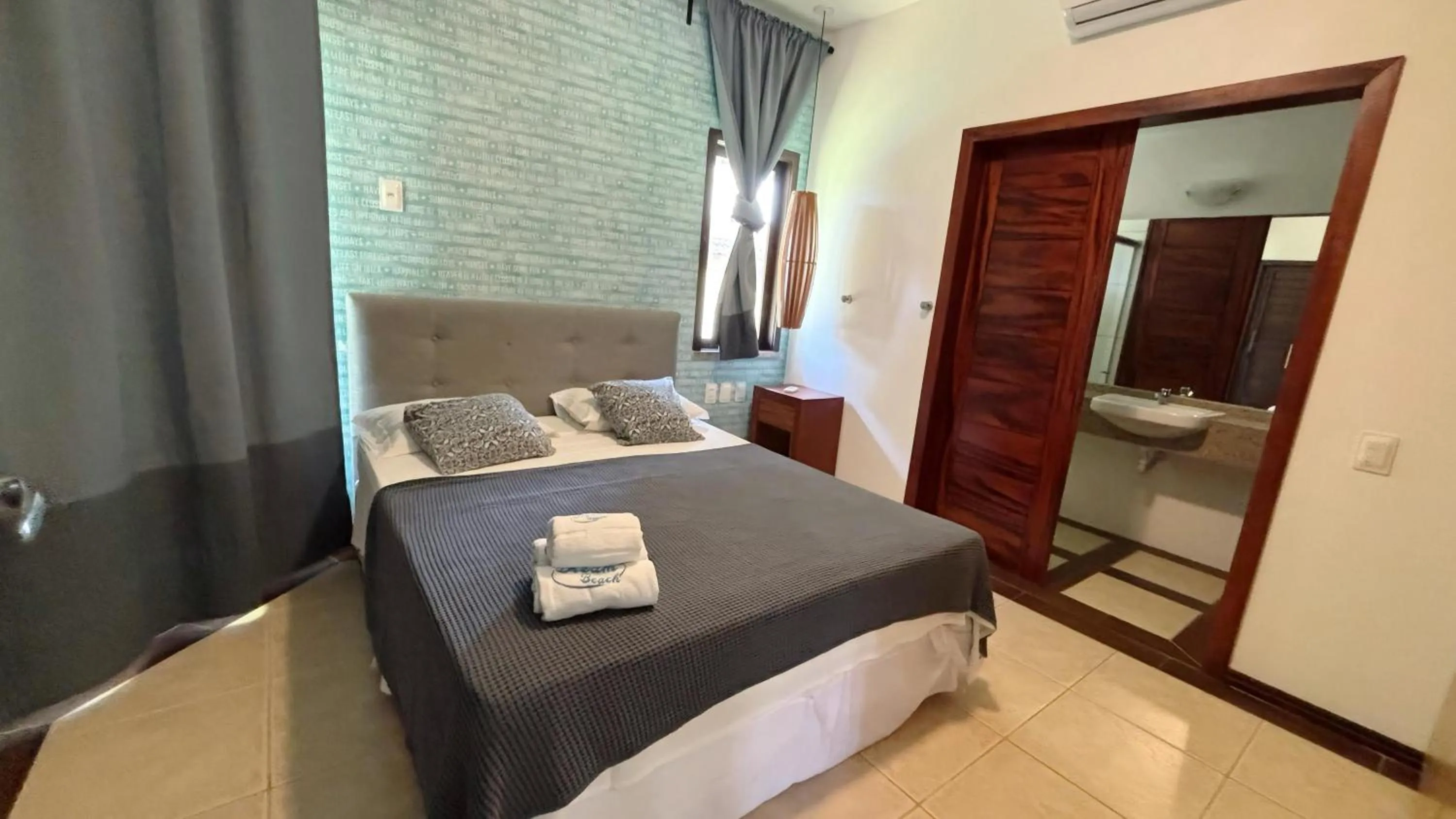 Bed in Dream Beach Cumbuco Oceanfront Apartments