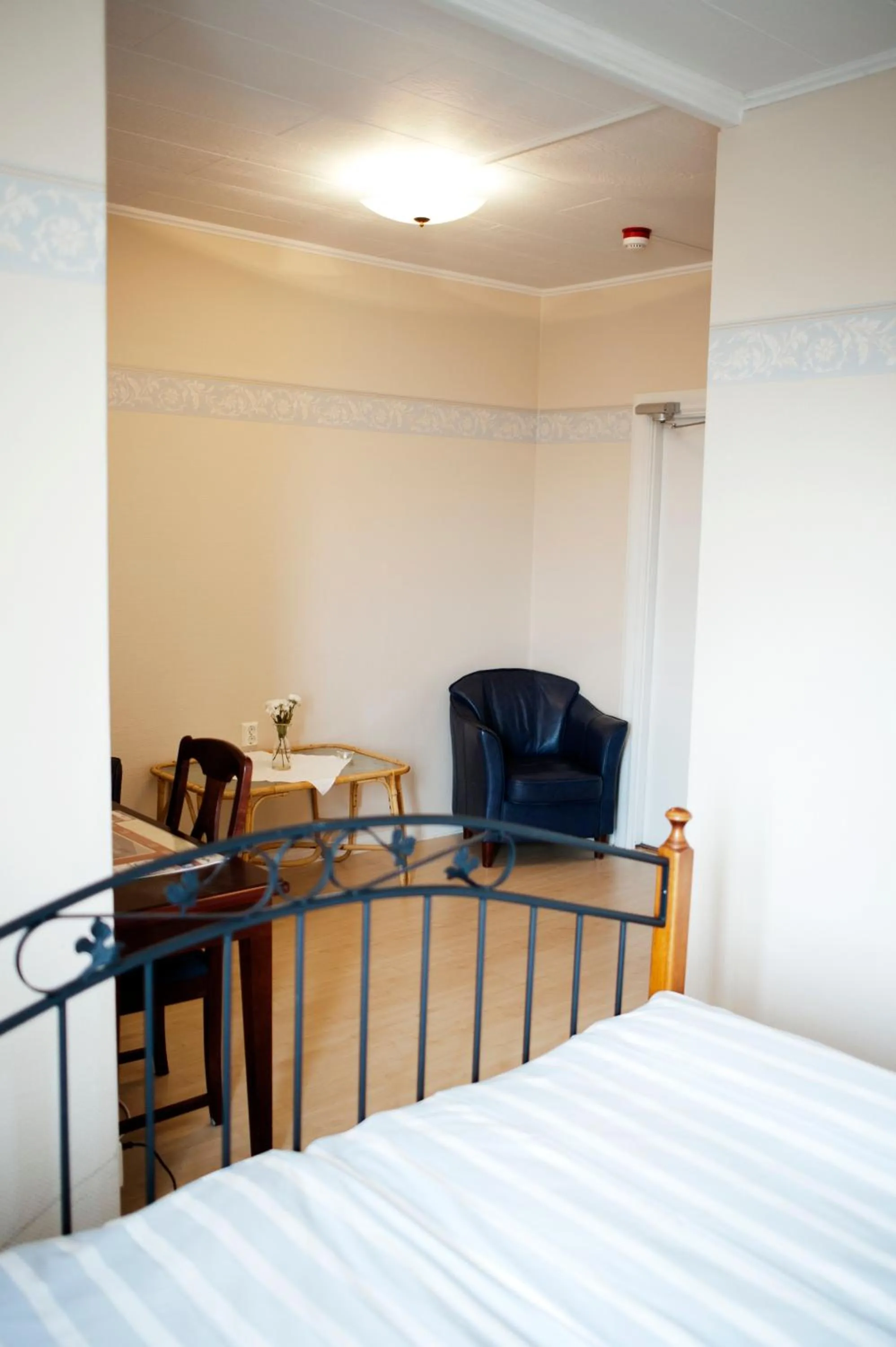 Seating area, Bed in Reftele Wardshus