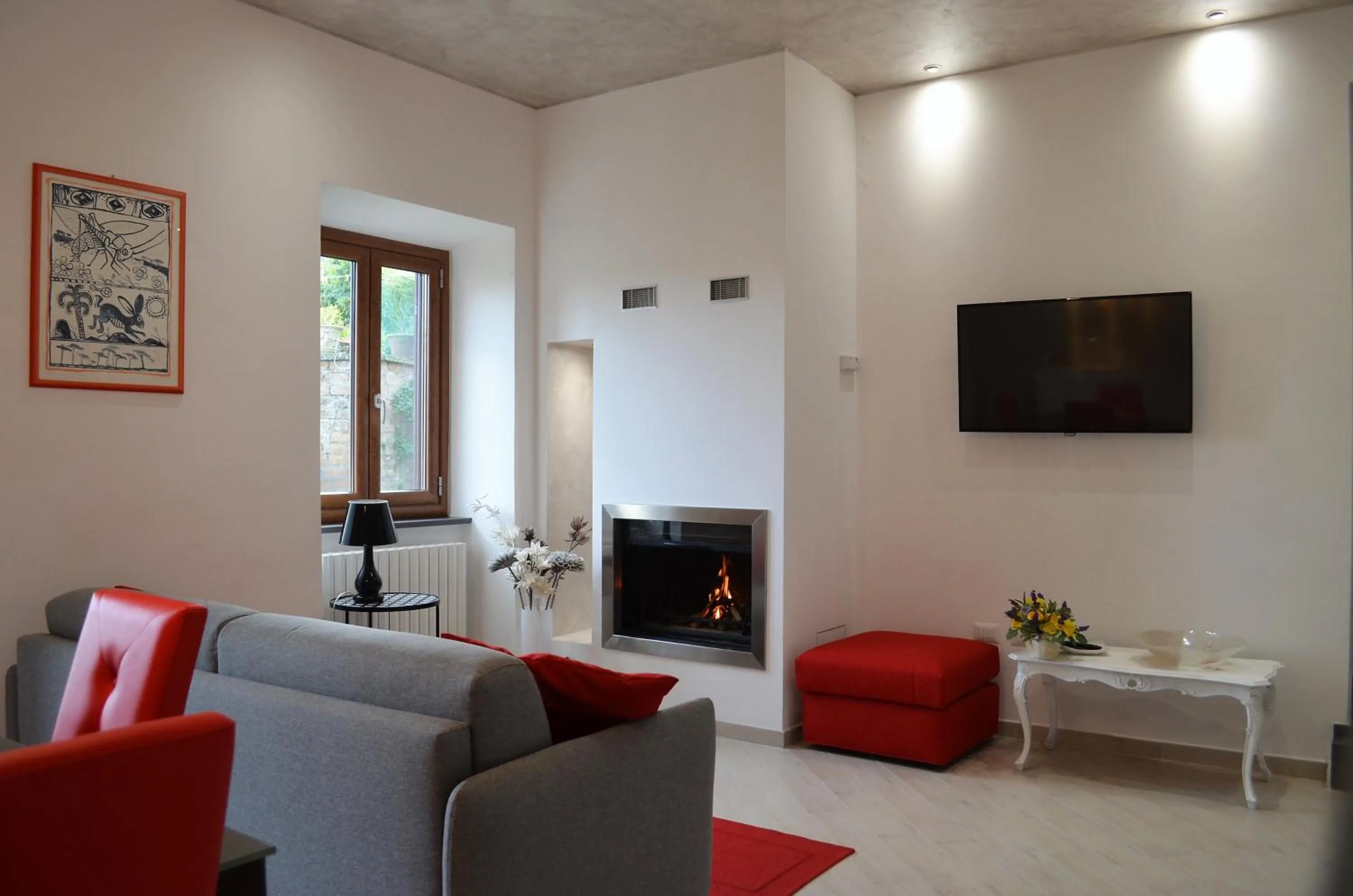 Communal lounge/ TV room in Il giardino di Elena