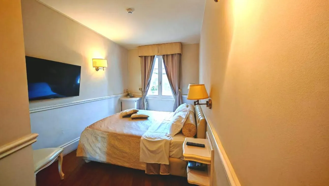 Bed in Suite Hotel Santa Chiara