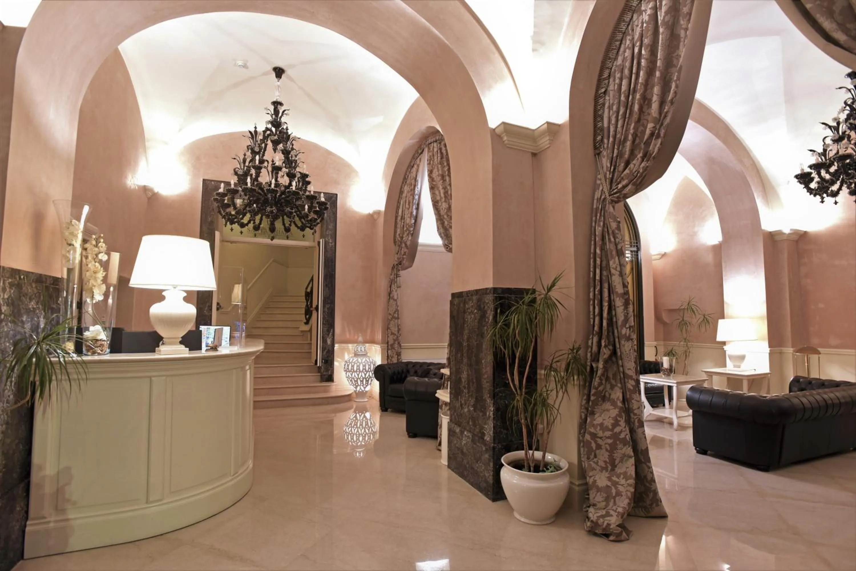 Lobby or reception in Suite Hotel Santa Chiara