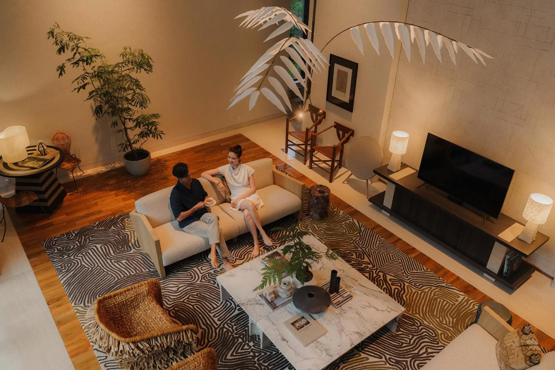 Communal lounge/ TV room in Capella Singapore