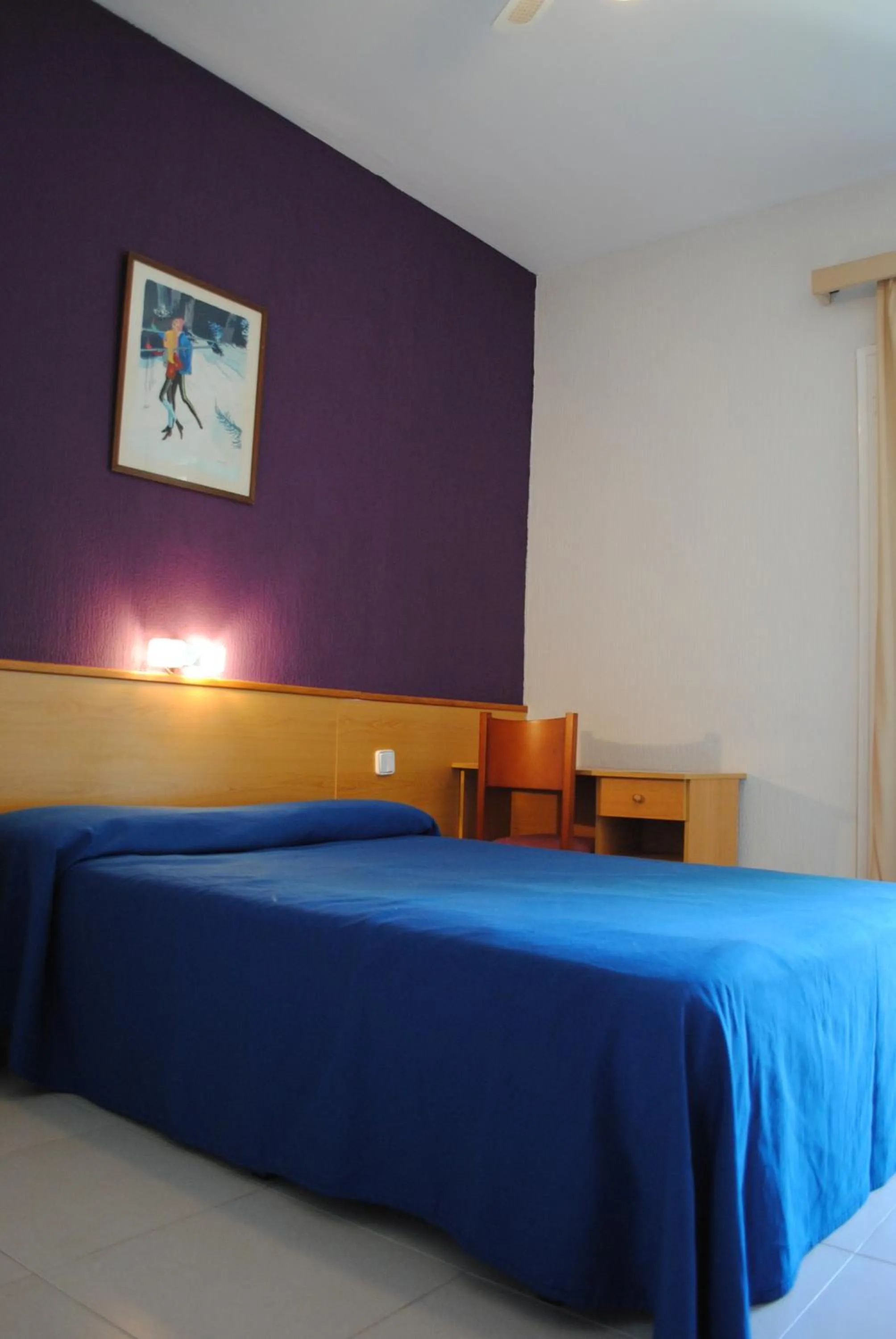 Bed in Hotel Sant Jordi