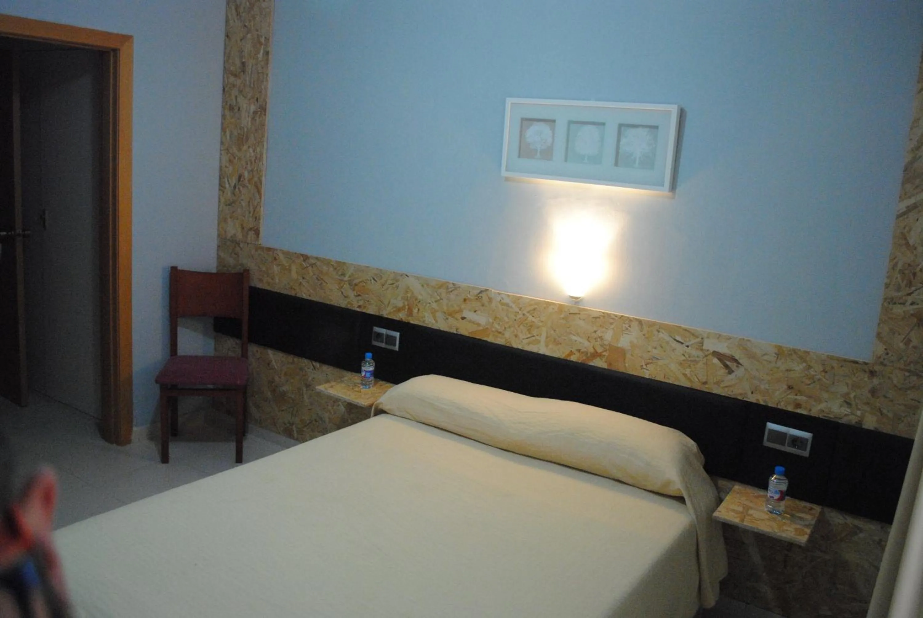 Bed in Hotel Sant Jordi