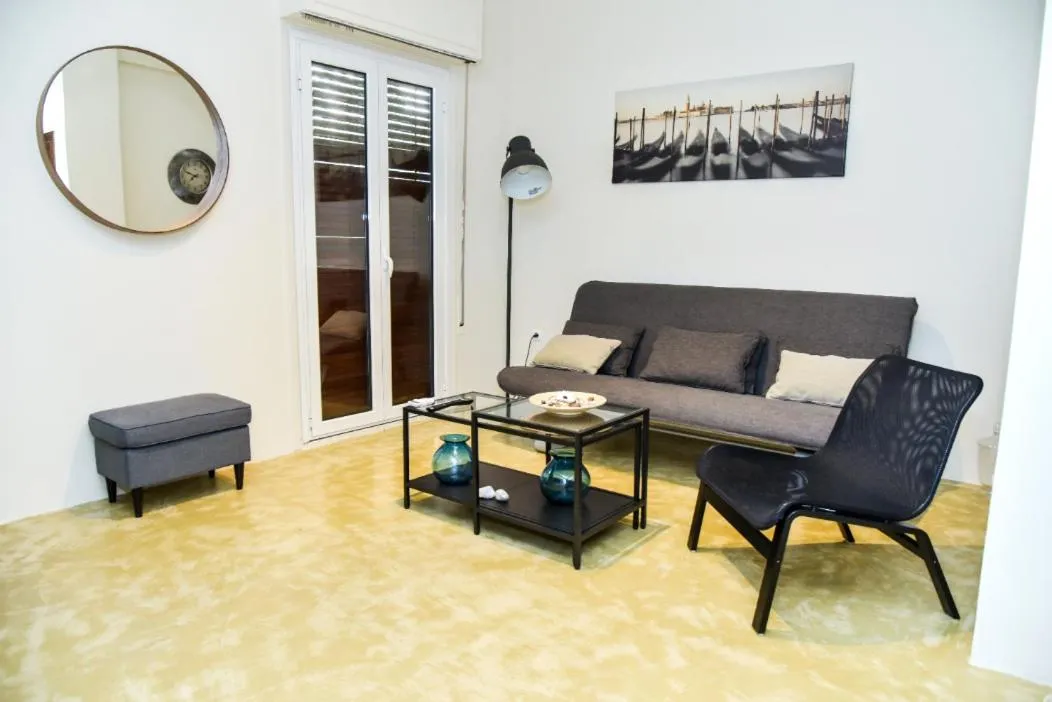 Living room in Central apartment at Echarxia 2 beds for 5 pers by MPS