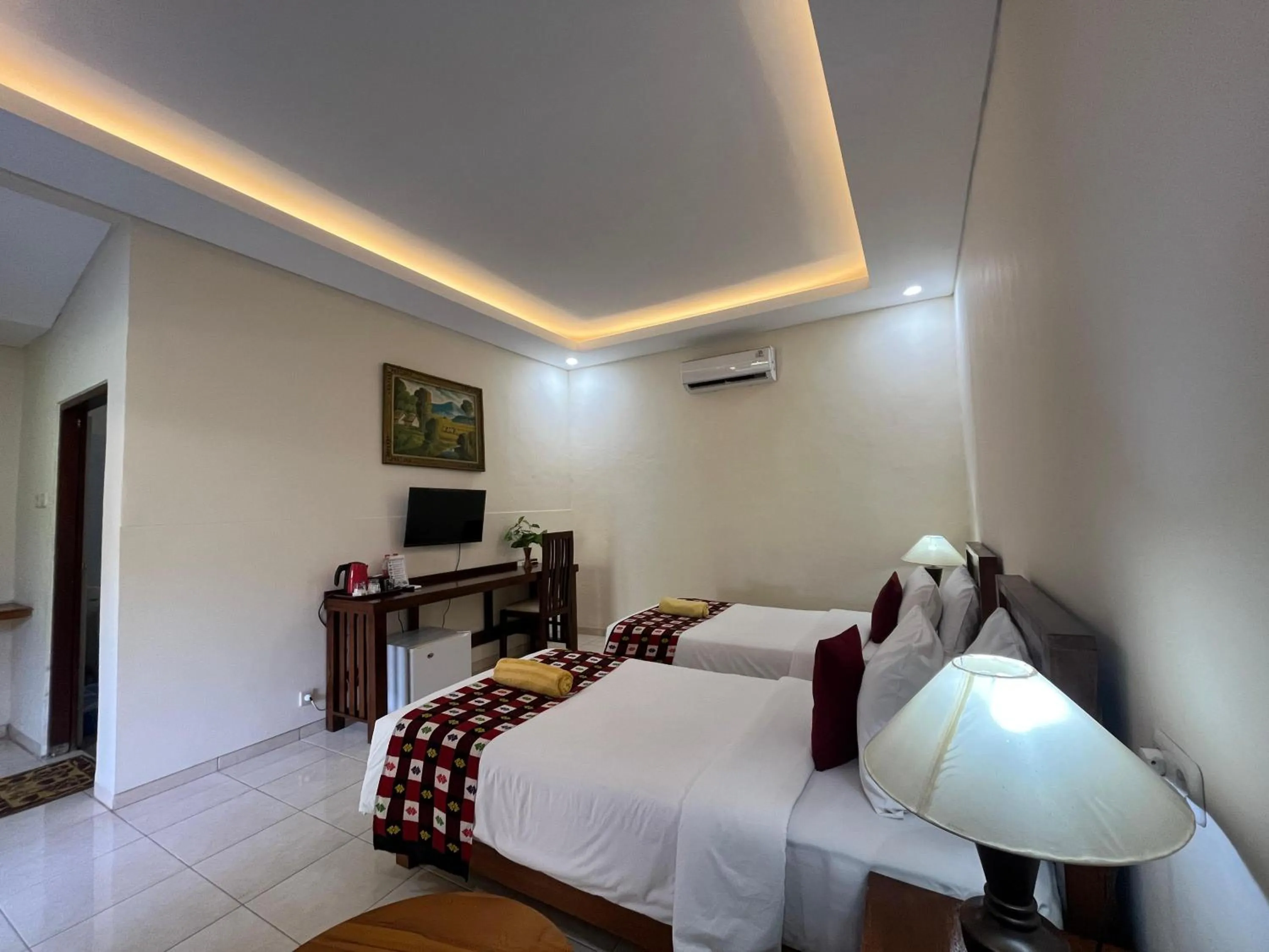 Bed in Lovina Beach Hotel