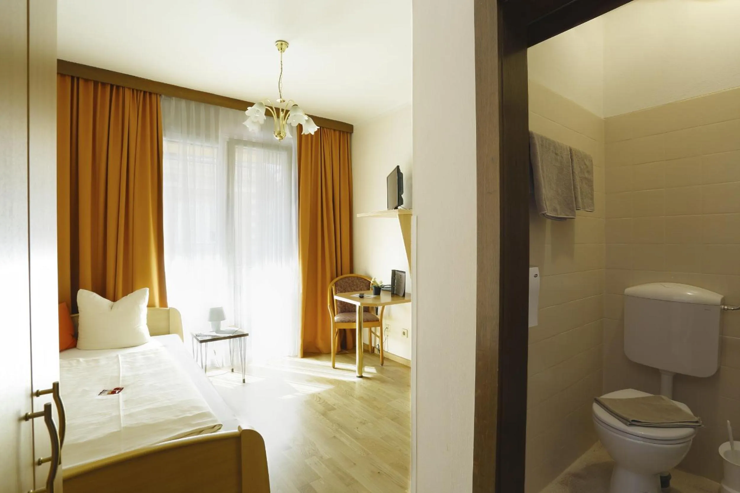 Photo of the whole room, Bed in Alpen.Adria.Stadthotel