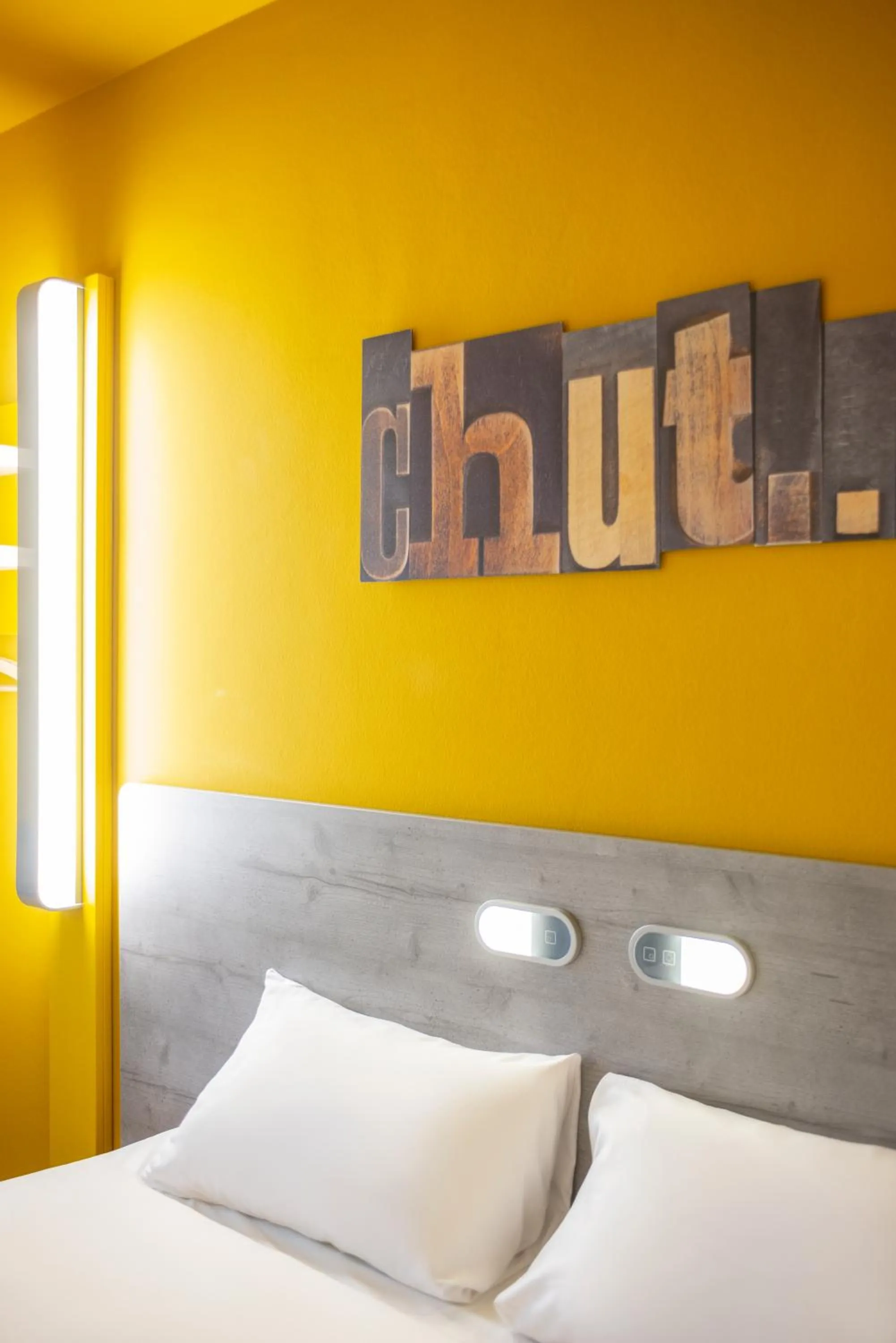 Decorative detail, Bed in ibis budget Amsterdam Airport