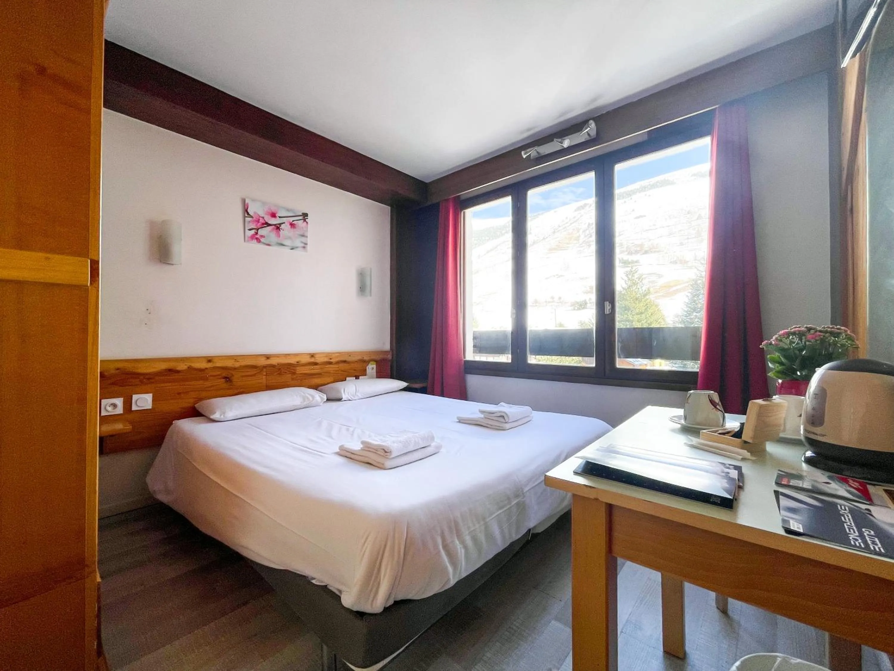 Bed in Atmosphere Hotel