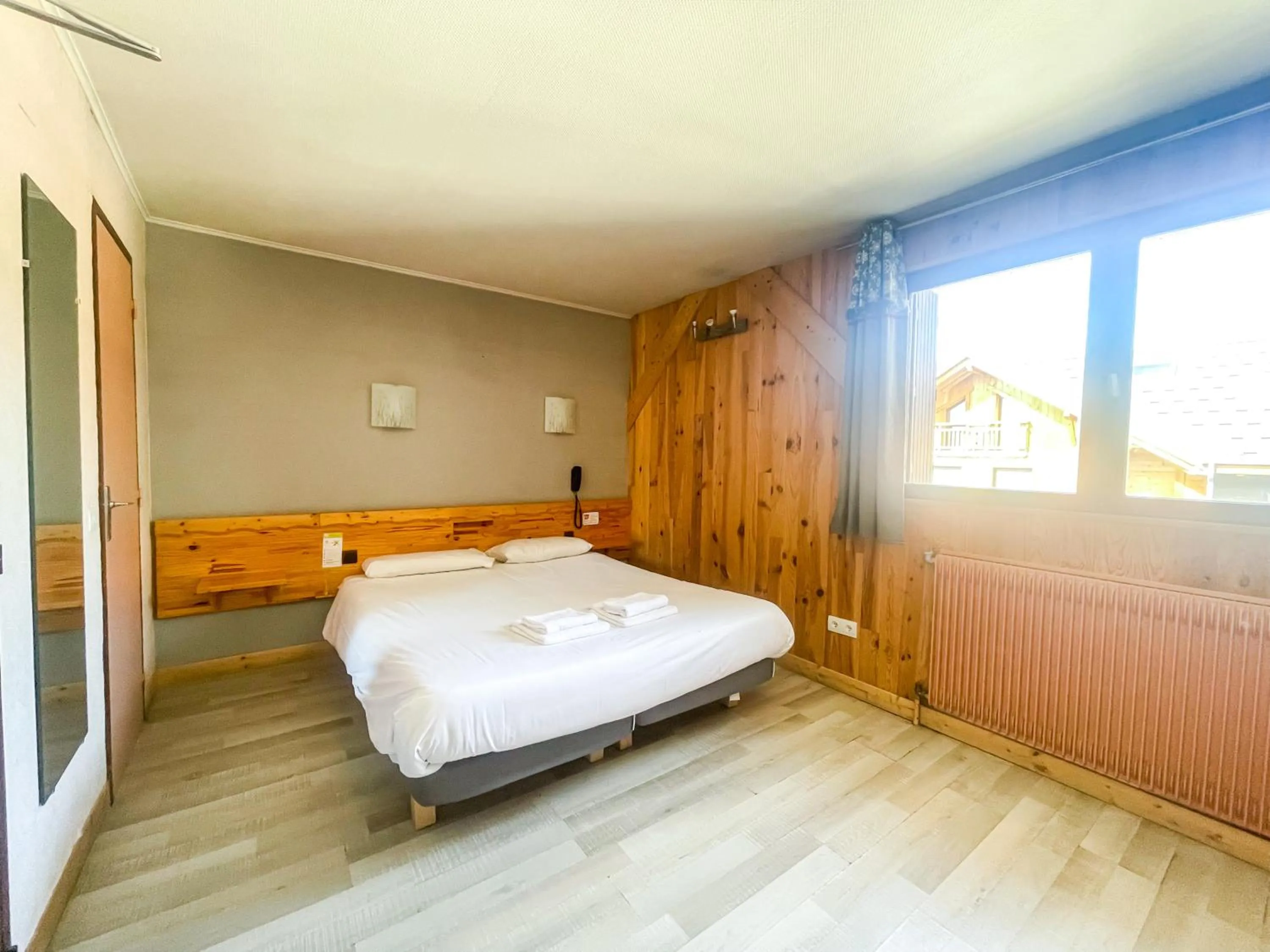 Bed in Atmosphere Hotel