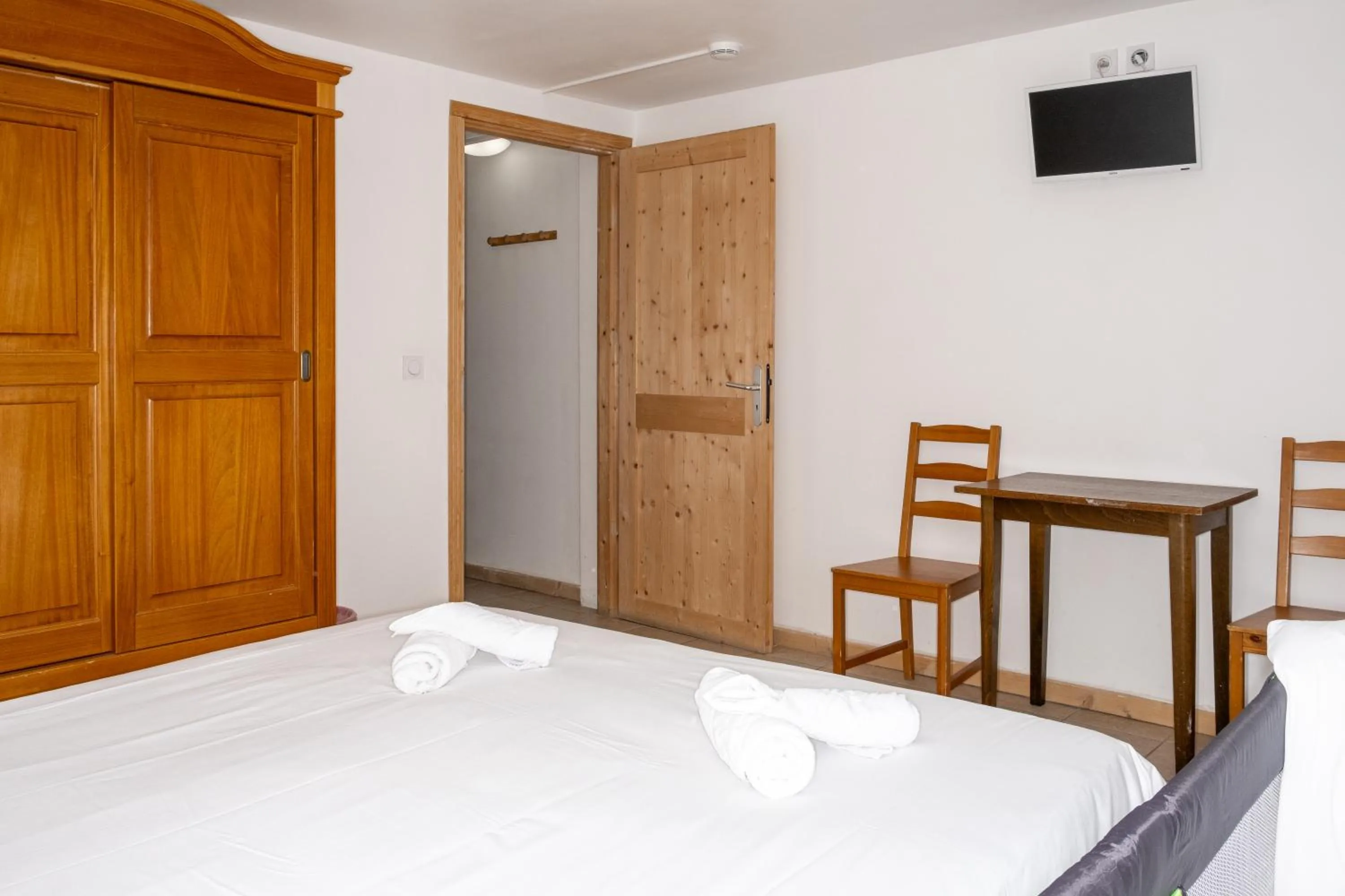 Bed in Atmosphere Hotel