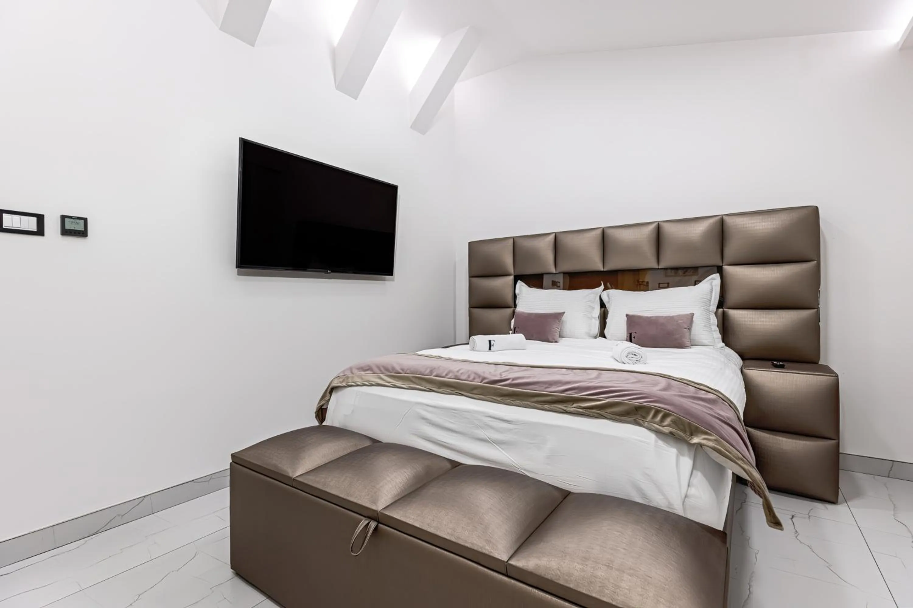 Bed in ForS Resort & Spa