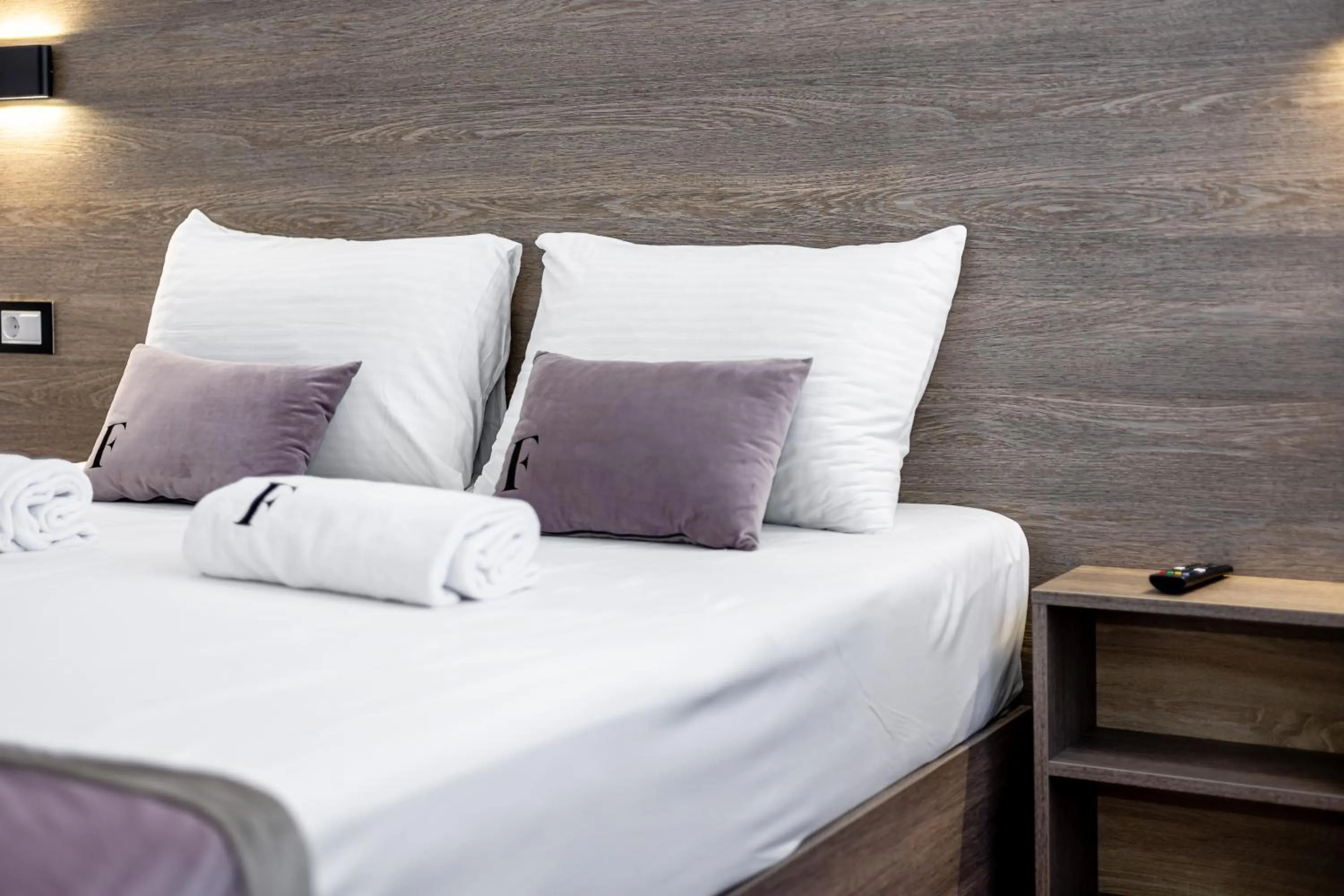 Bed in ForS Resort & Spa