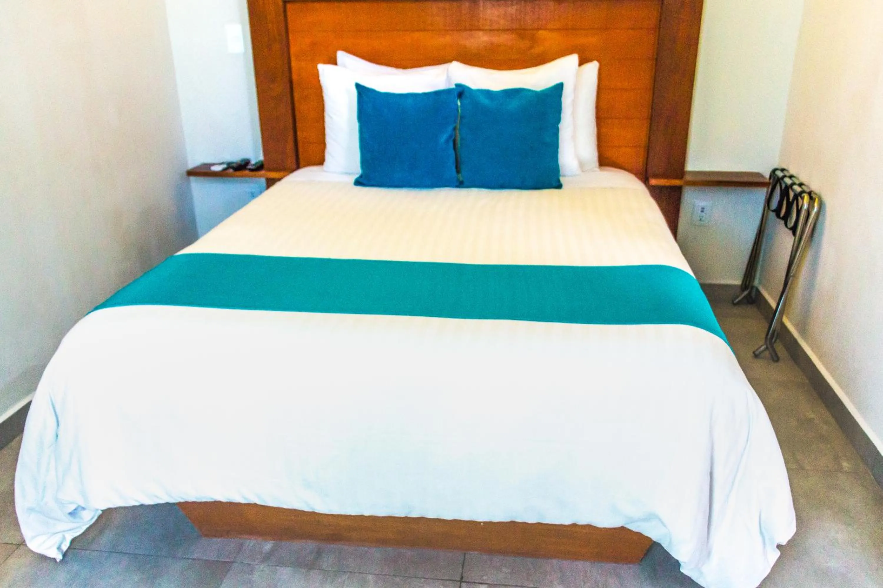 Bed in Aquastar Unique Hotel & Apartments Mahahual