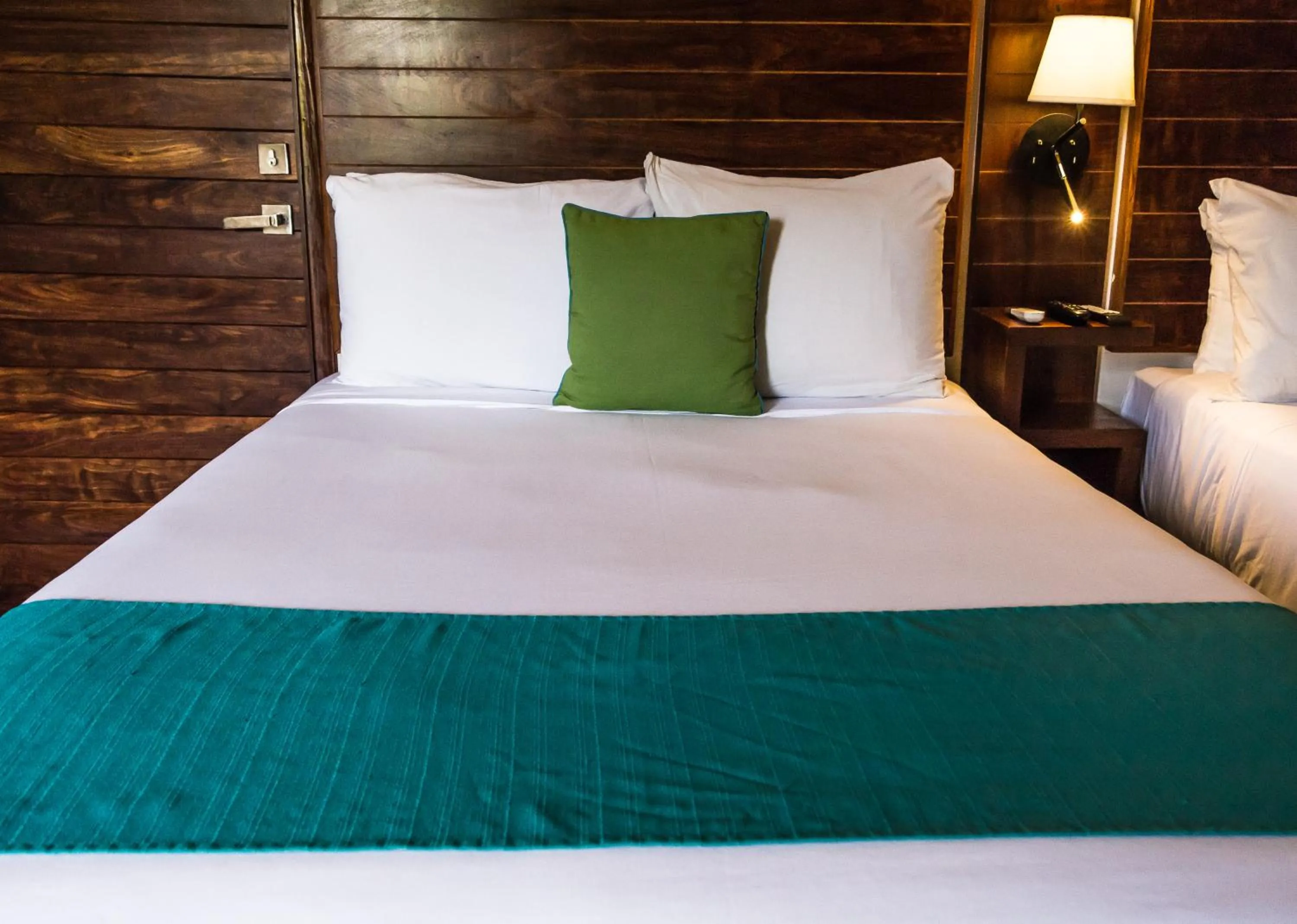 Bed in Aquastar Unique Hotel & Apartments Mahahual